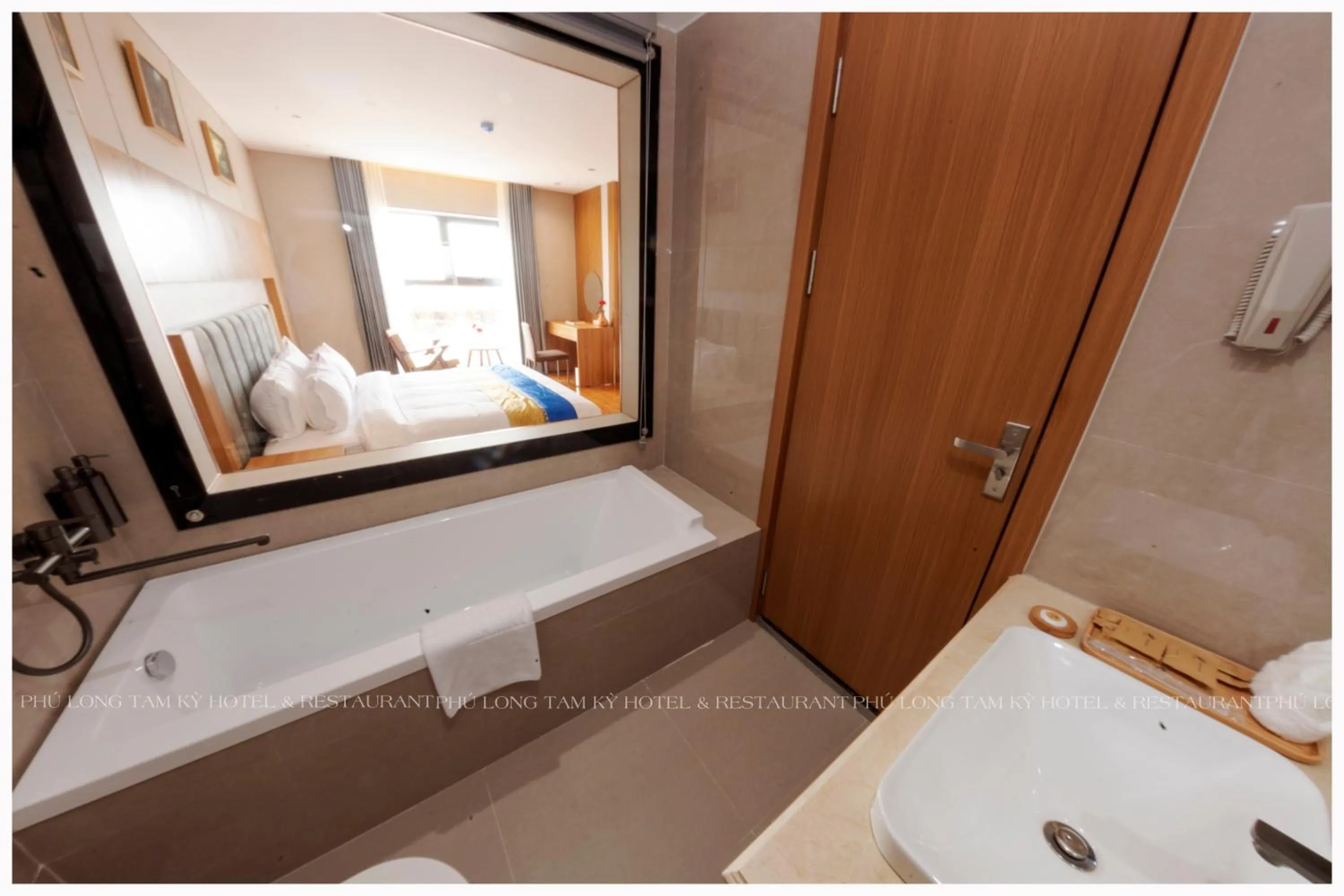 Bathroom, Bed in Phú Long Tam Kỳ Hotel & Restaurant