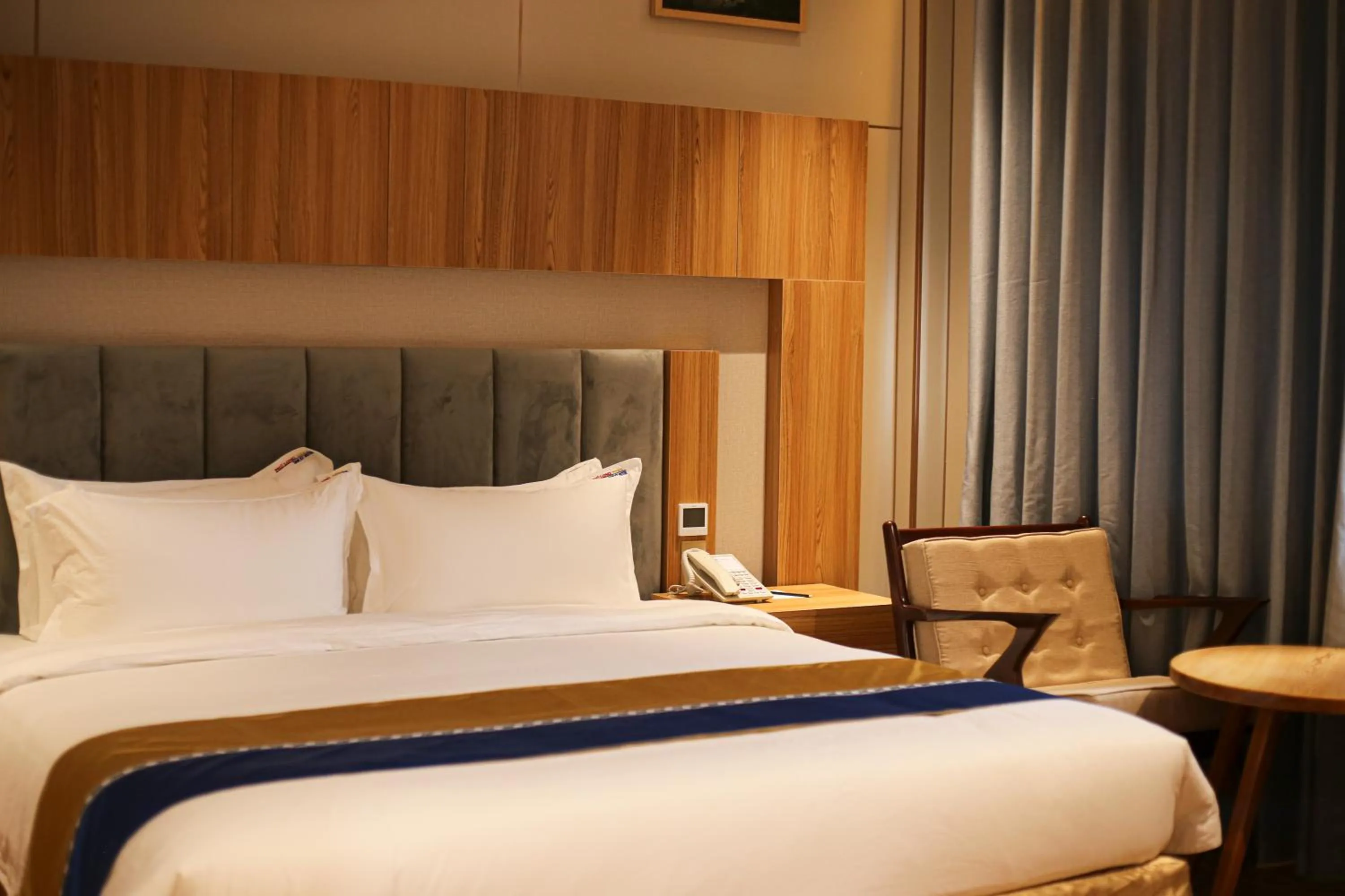 Bed in Phú Long Tam Kỳ Hotel & Restaurant