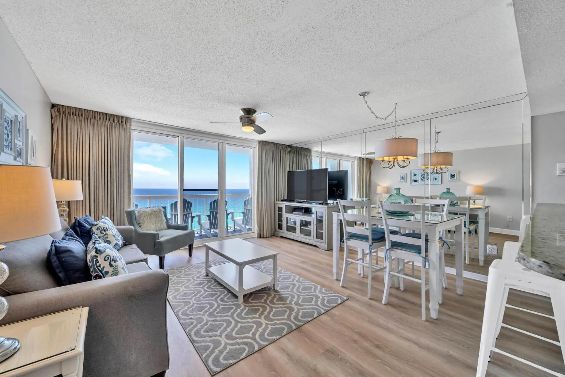 Living room in Pelican Beach Resort by Colasan