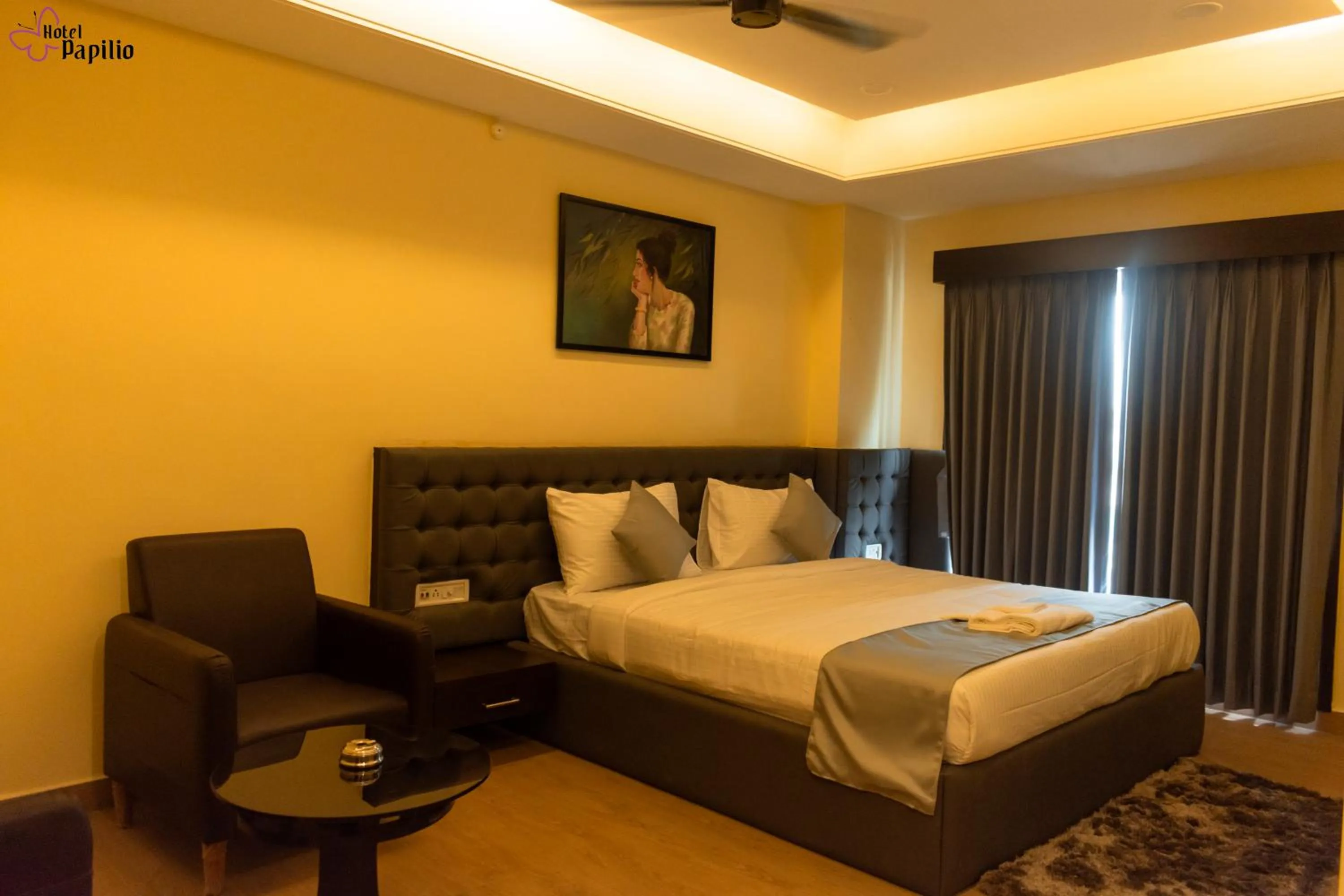 Bed in HOTEL PAPILIO