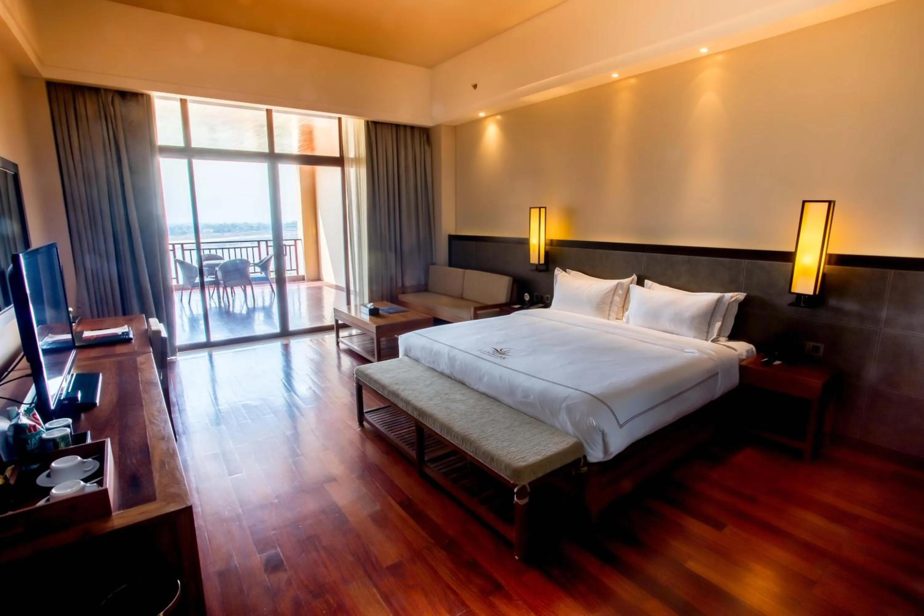 Bed in Landmark Mekong Riverside Hotel
