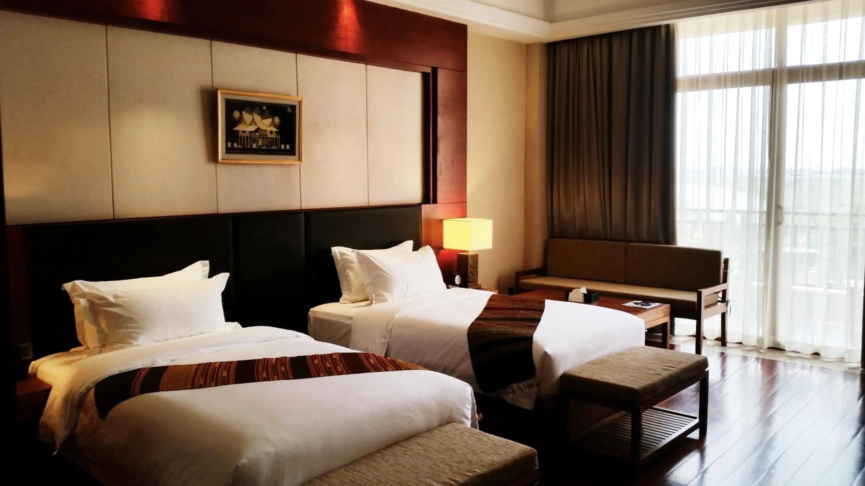 Seating area, Bed in Landmark Mekong Riverside Hotel