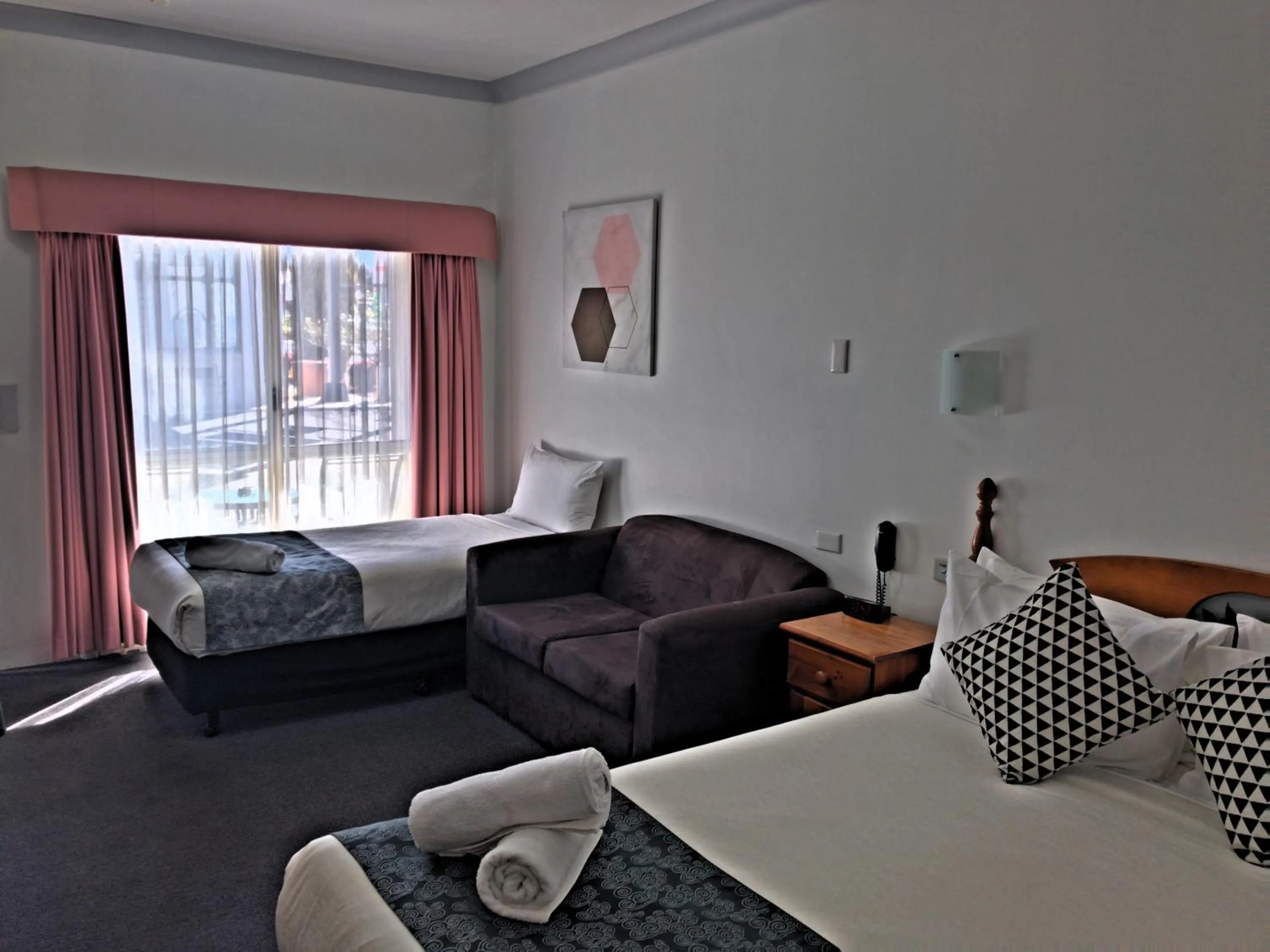 Bed in New England Motor Inn