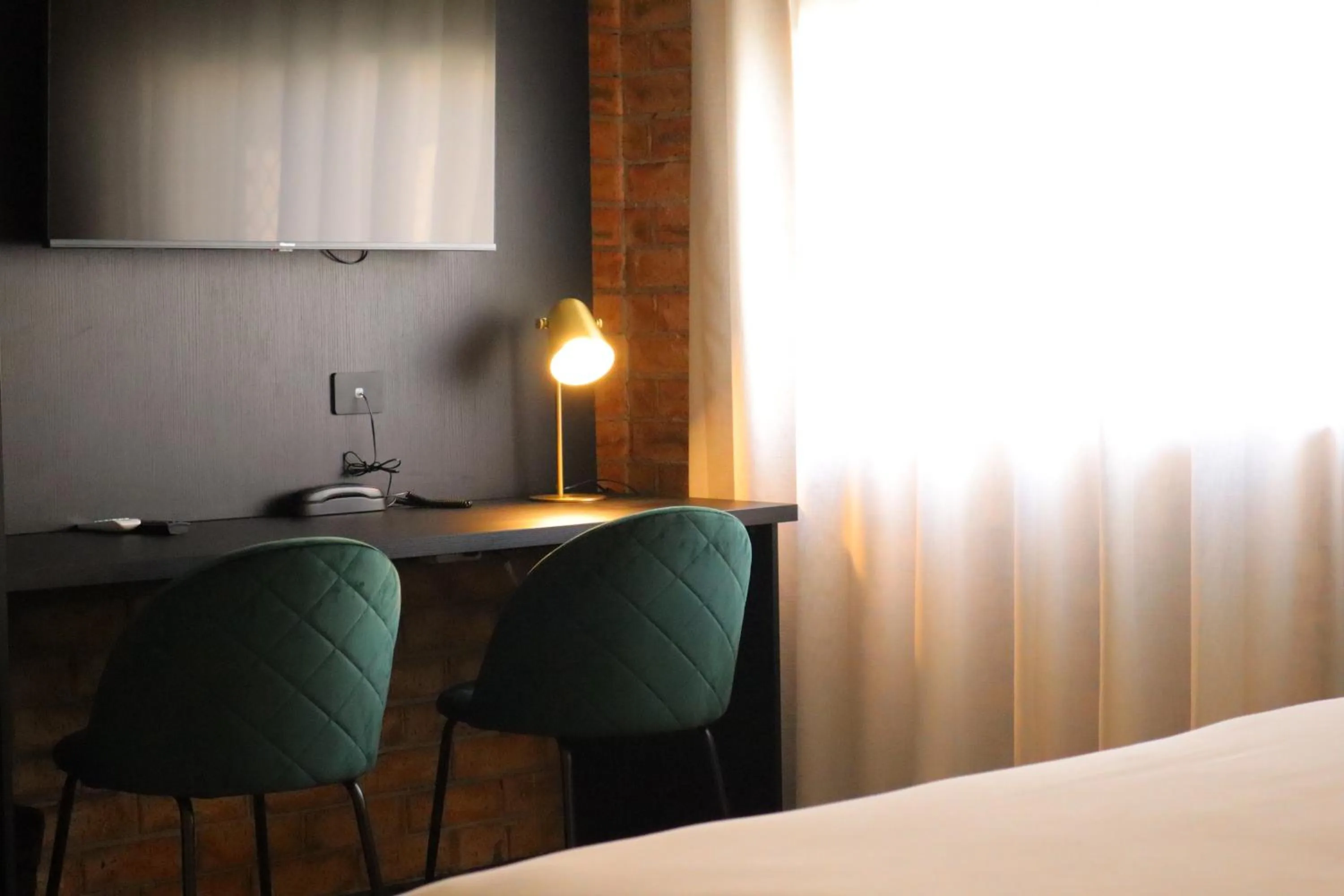 Seating area in Quality Hotel Robertson Gardens