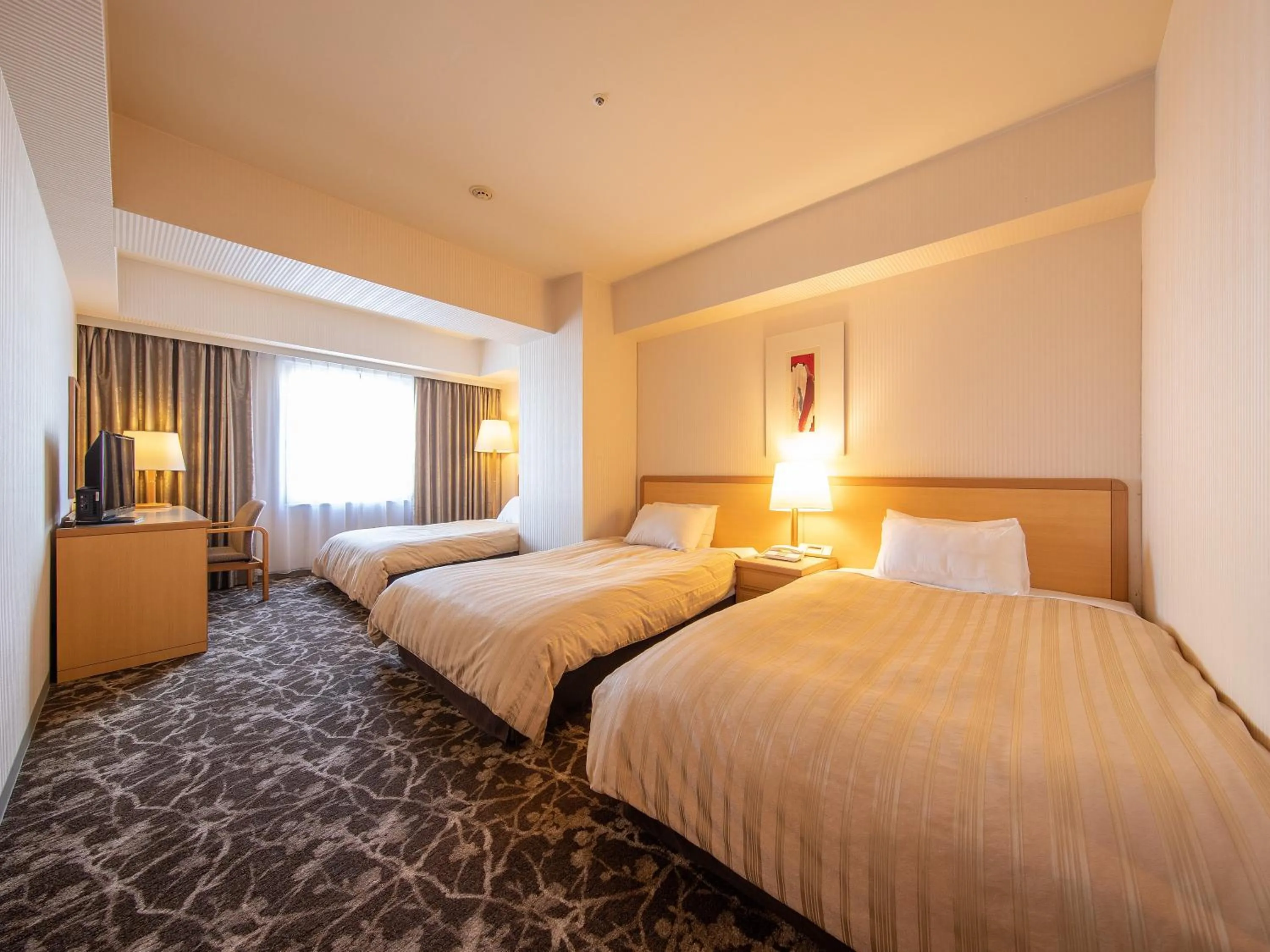 Bed in President Hotel Mito