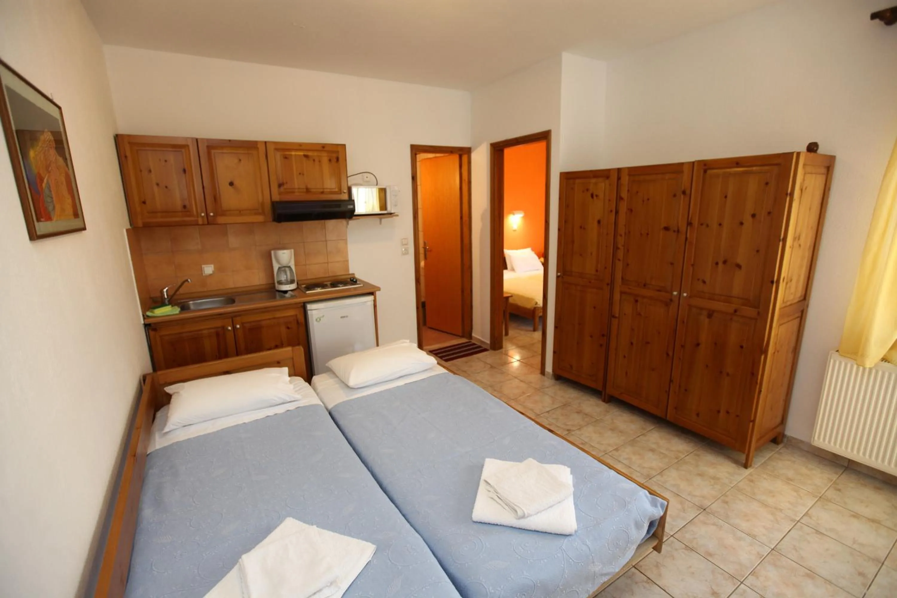 Bed in Nama Apartments