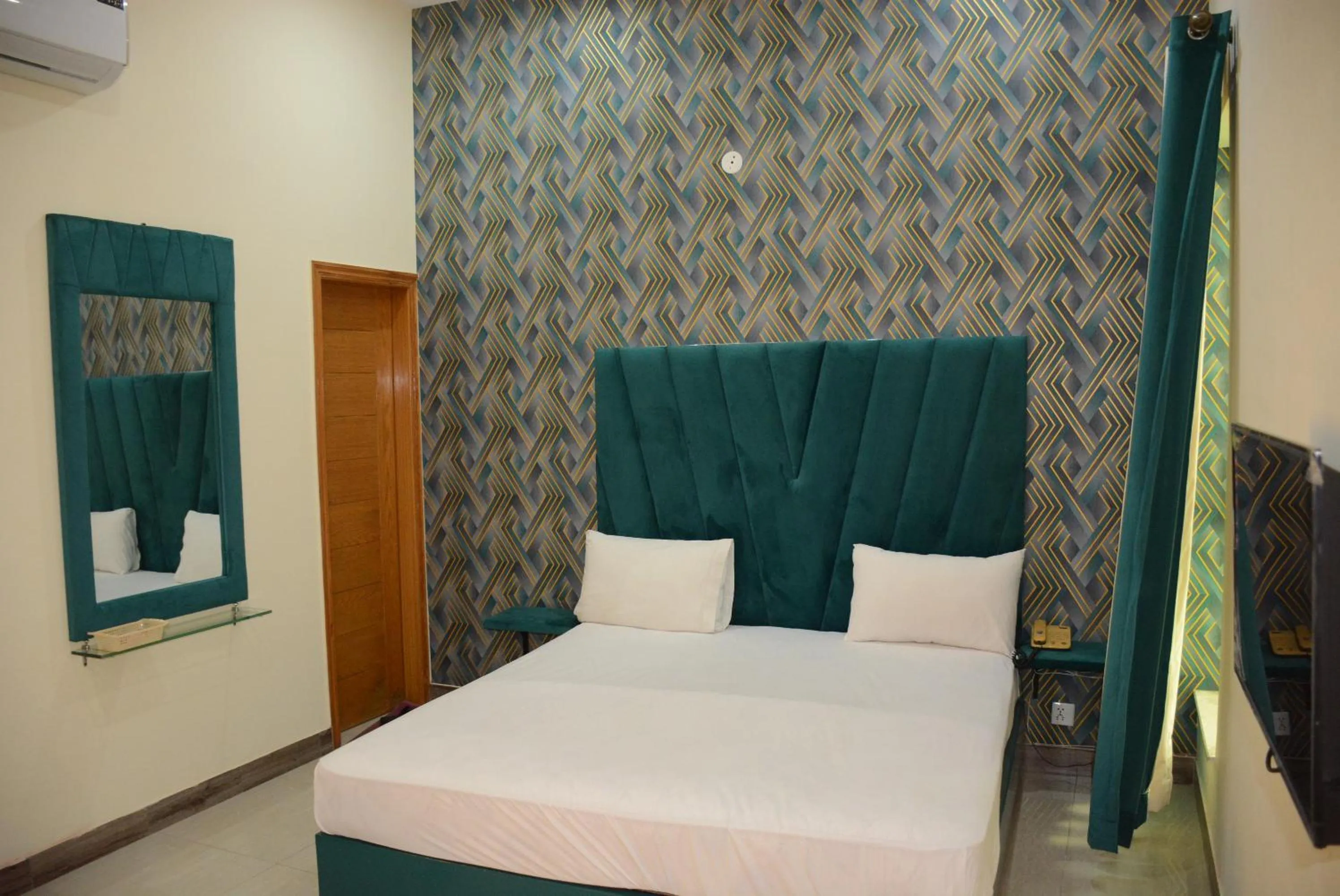 Photo of the whole room in Hotel The Taj Multan