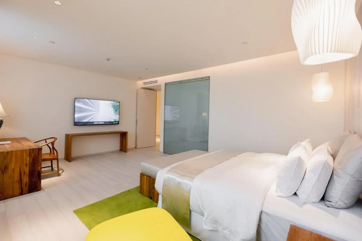 Communal lounge/ TV room, Bed in Chengdu Chengshe Hotel - Wenjiang University Town Southwest Caida Branch