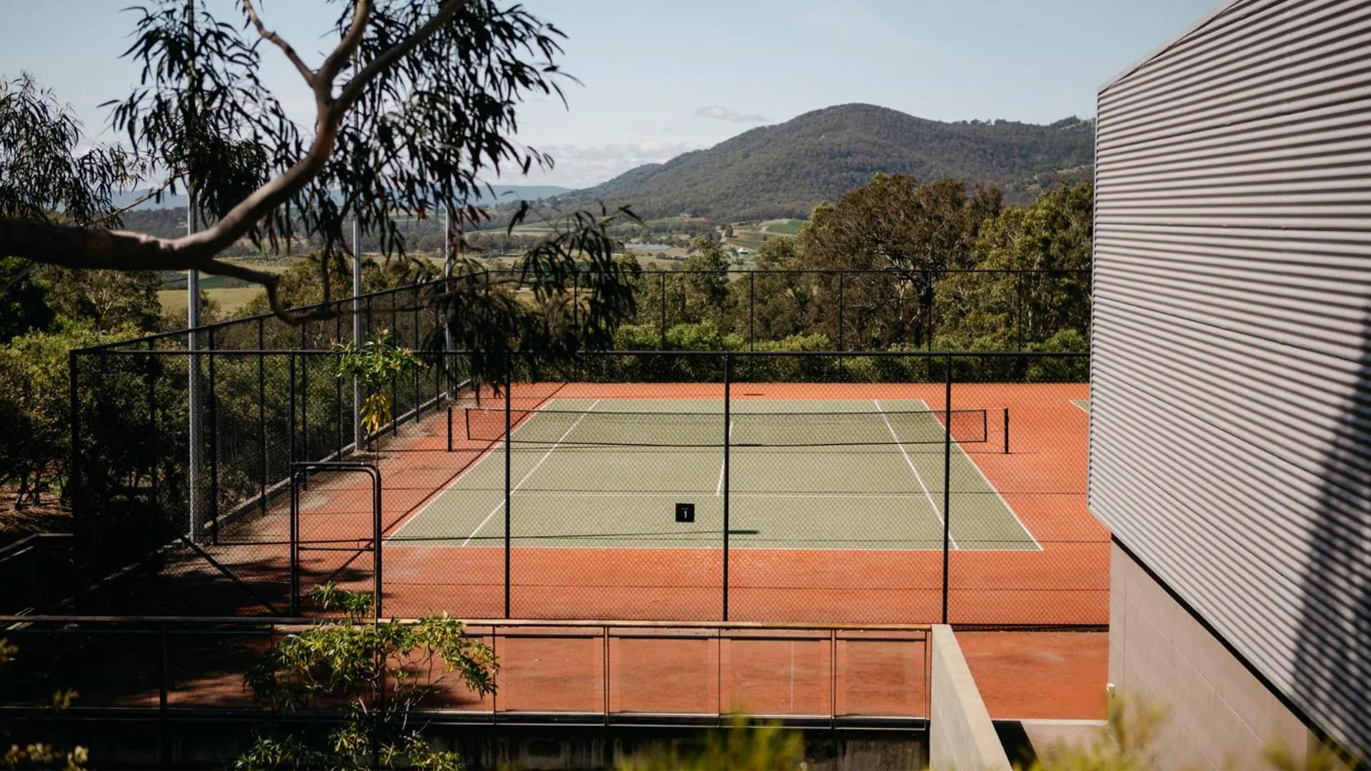 Tennis court in Elysia Wellness Retreat