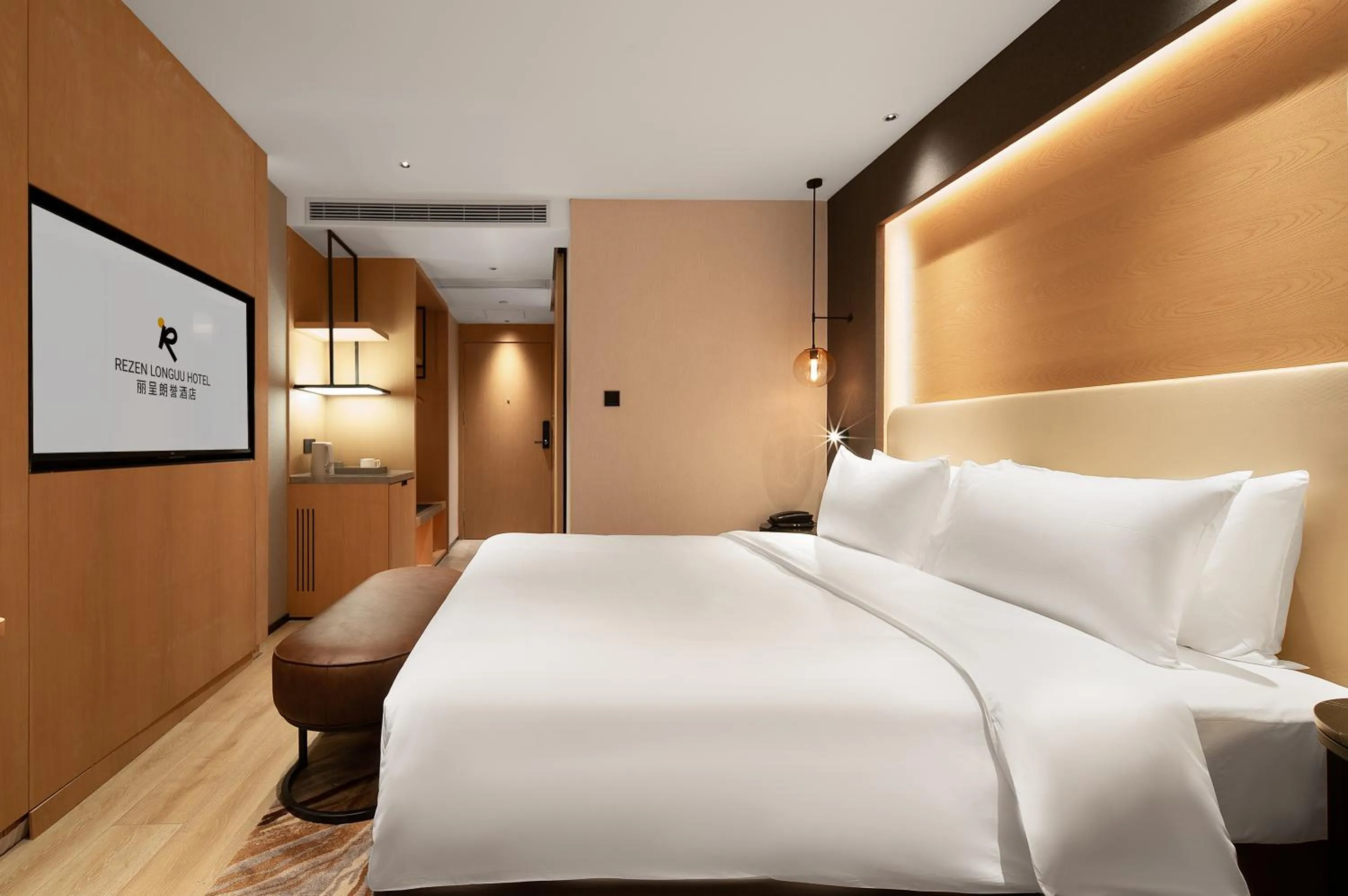Photo of the whole room, Bed in Langham Honor International Hotel Canton Fair Complex Branch - Free Shuttle to Canton Fair Complex During Canton Fair Period & Free Mini Bar
