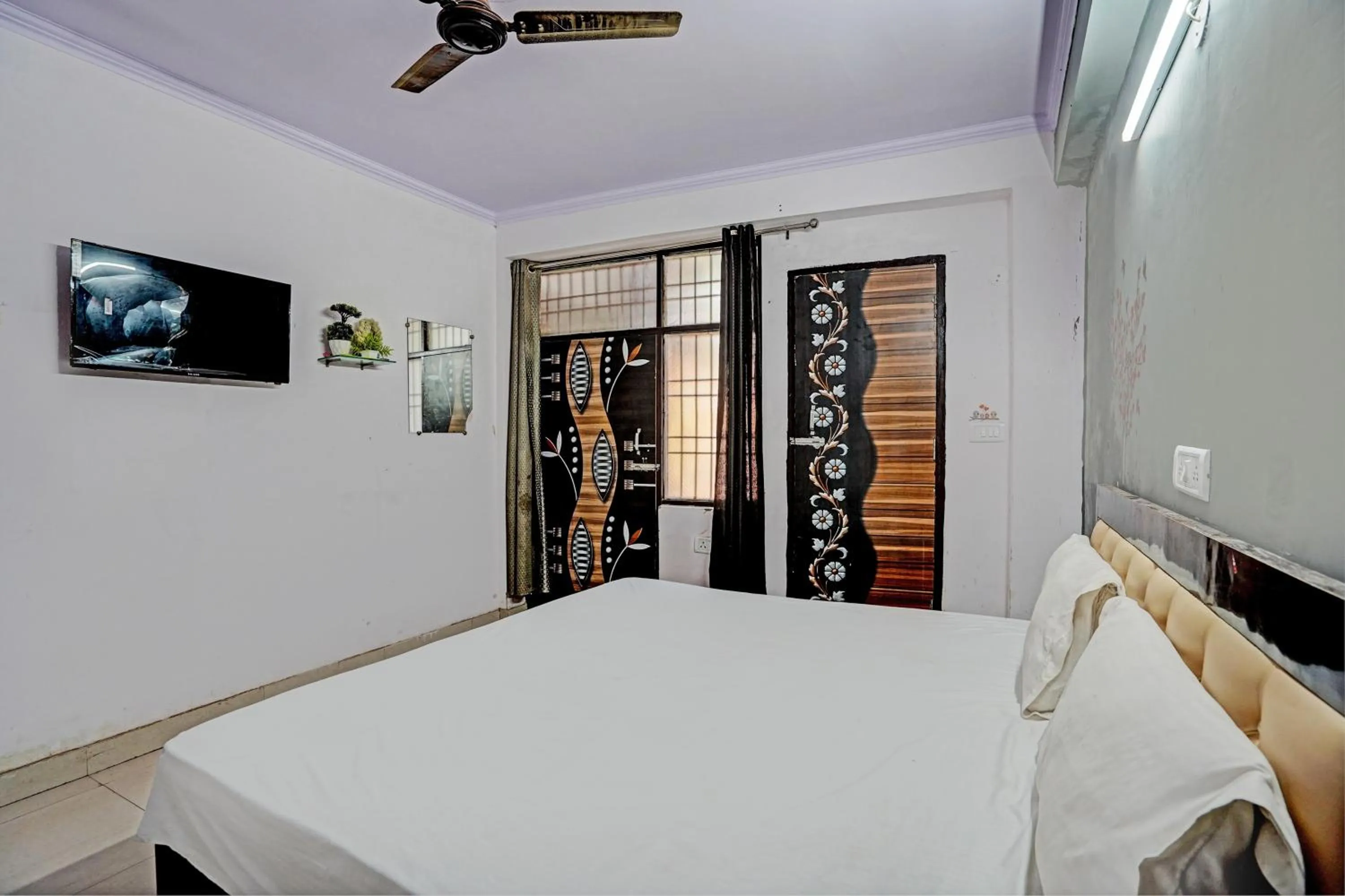 Bedroom in Hotel O Krishna Residency