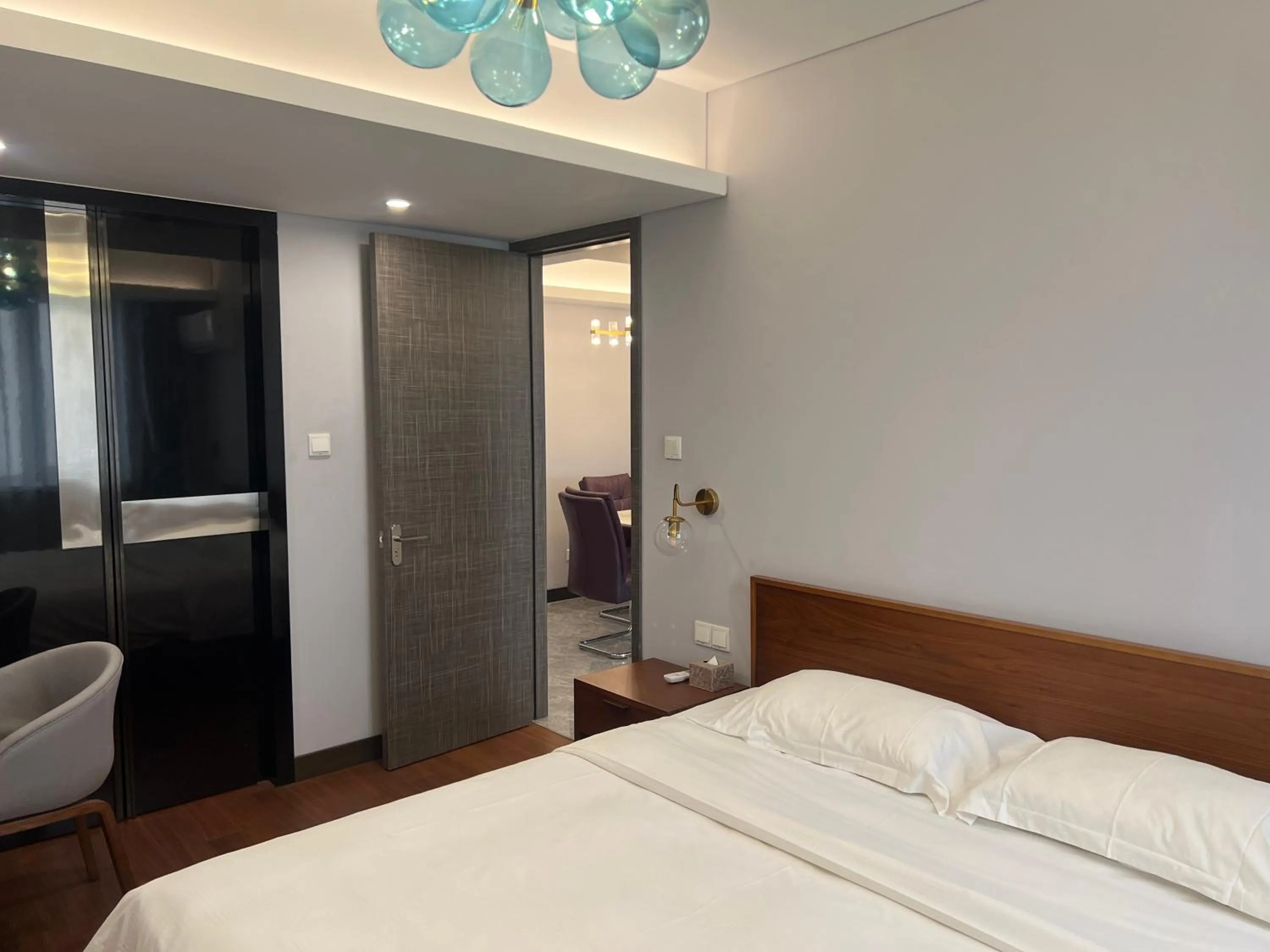 Bed in Guangyao Service Apartment Beijing Ritan