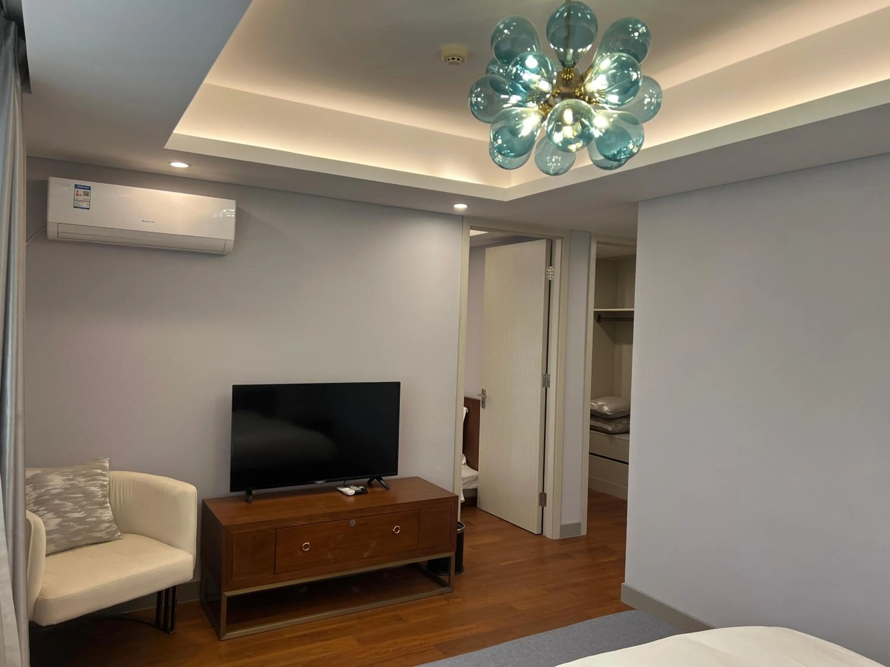 Bed in Guangyao Service Apartment Beijing Ritan