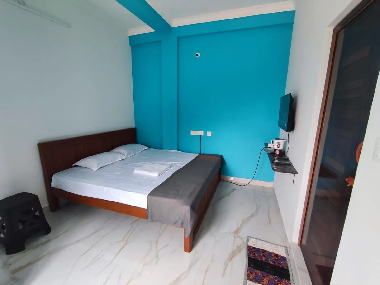 Bed in Sri Aksha Residency