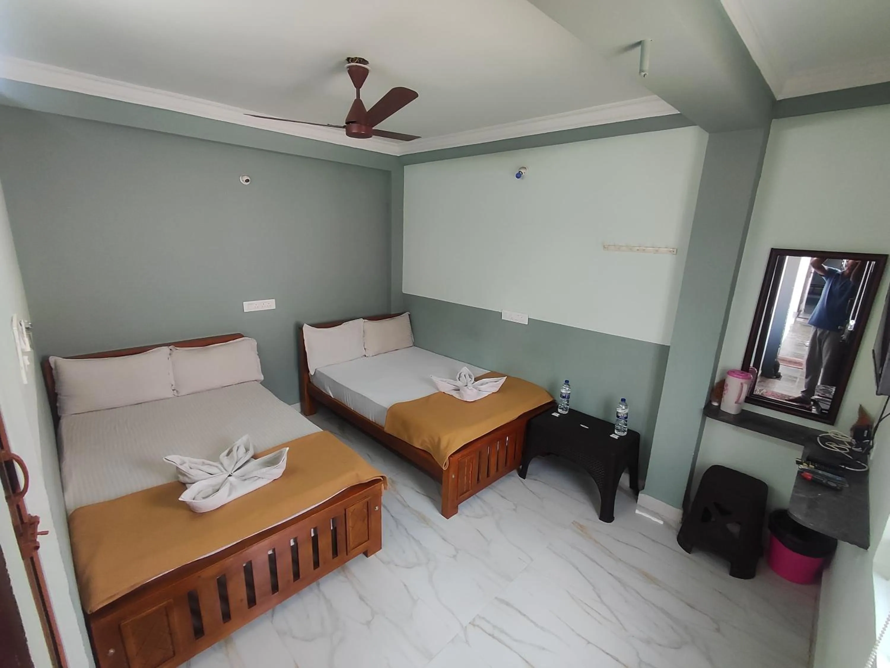 Bed in Sri Aksha Residency