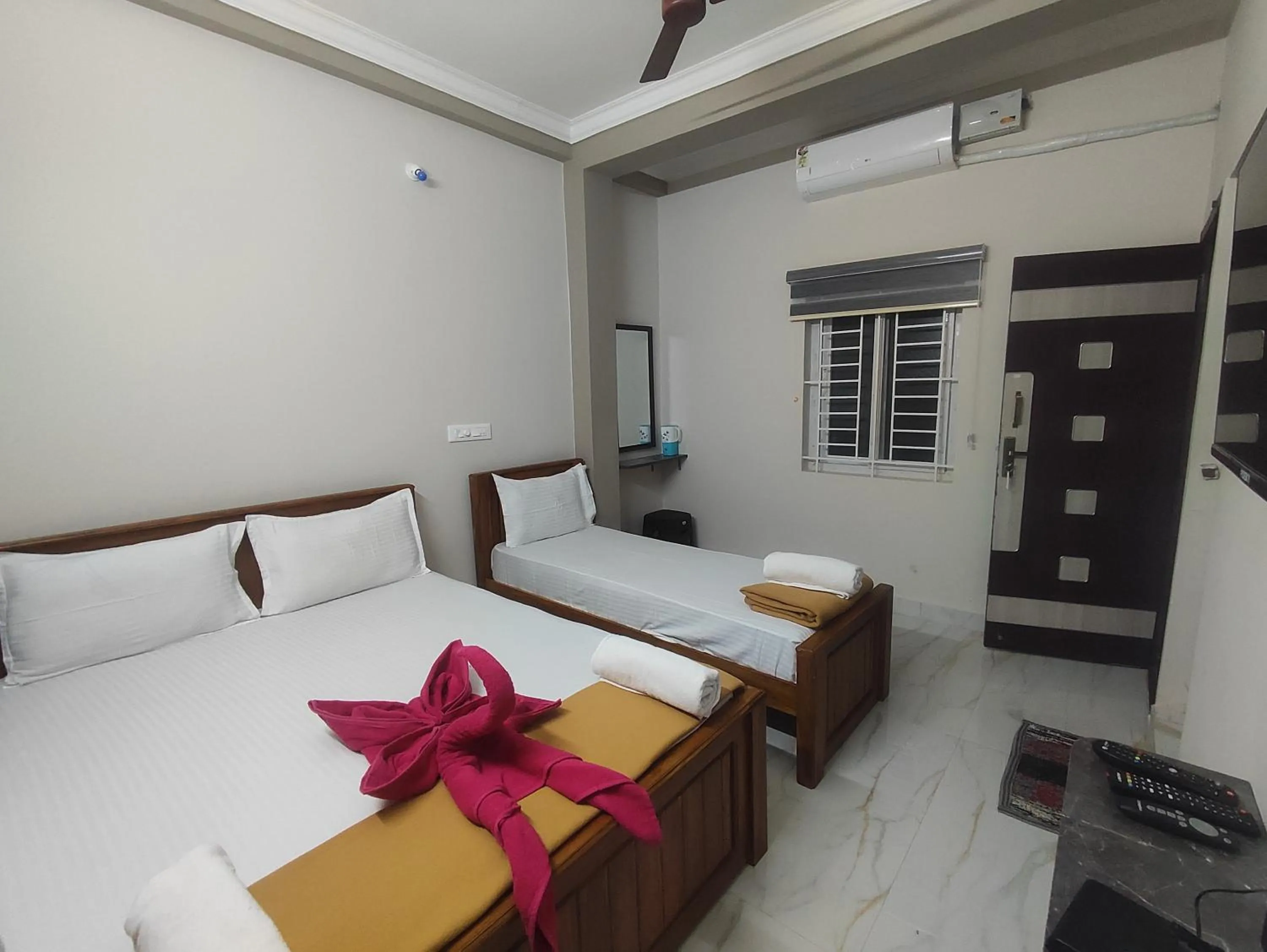 Bed in Sri Aksha Residency