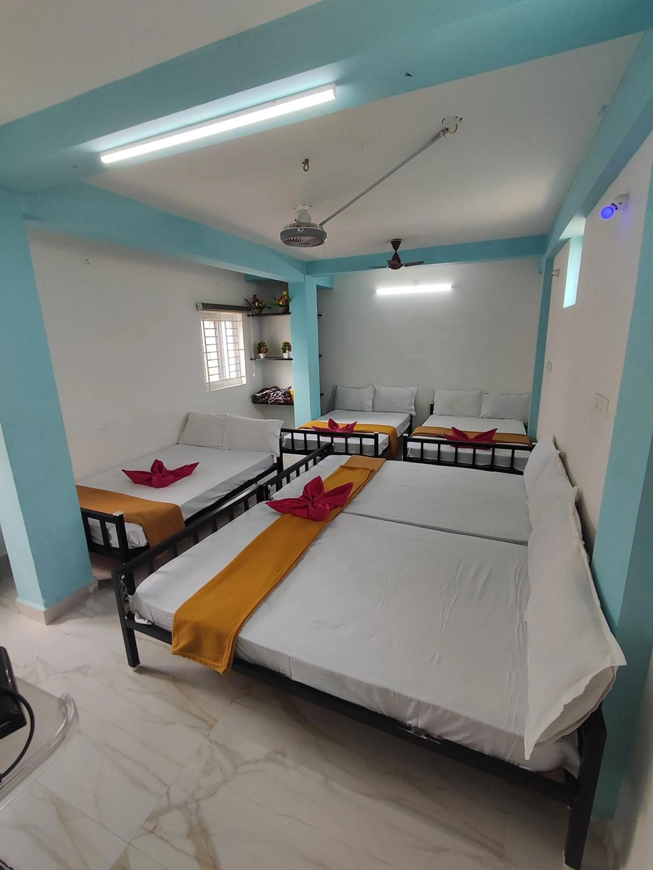 Bed in Sri Aksha Residency