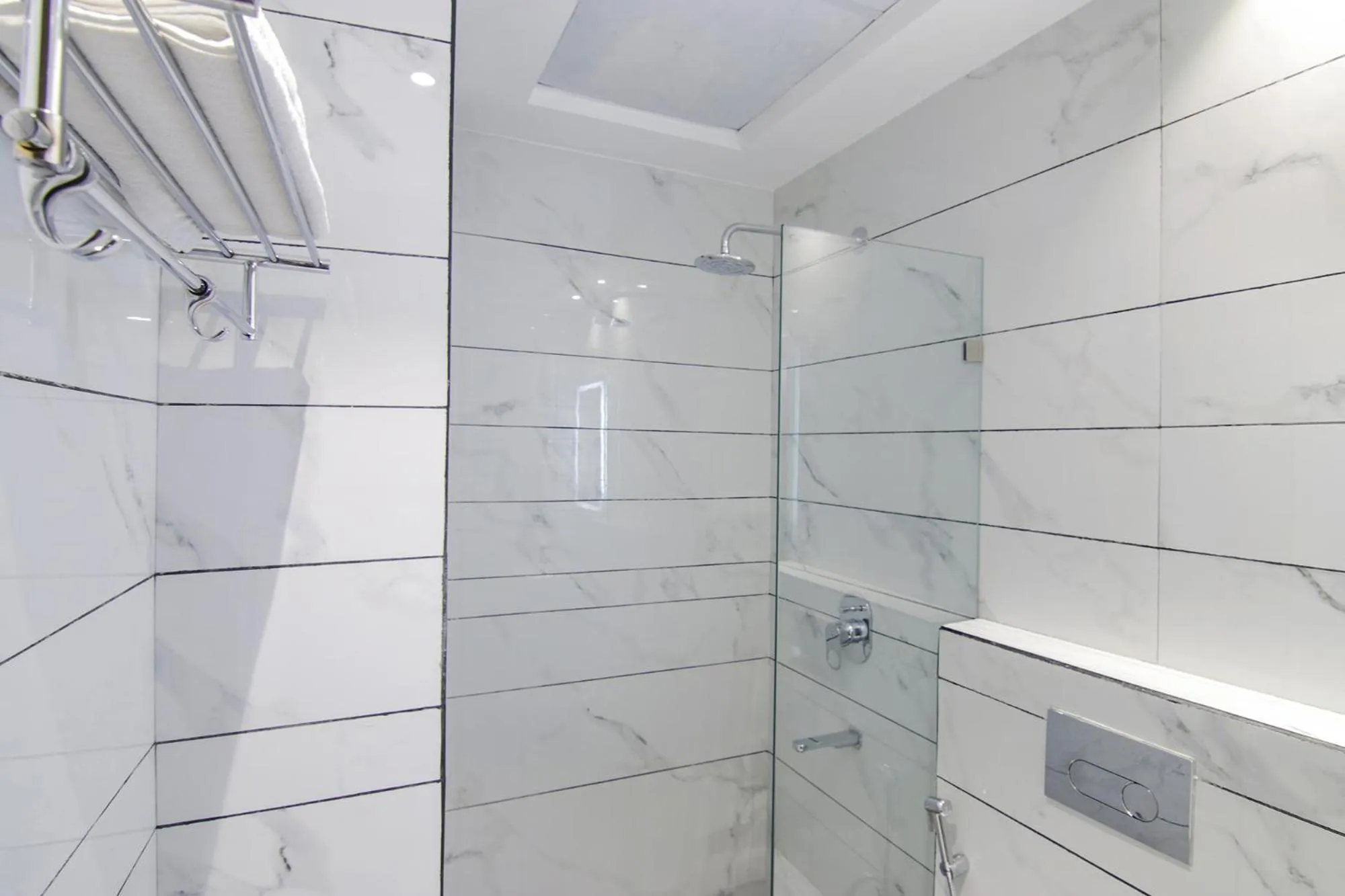 Bathroom in FabHotel Prism Grand - Nr Zirakpur Bus Stand'