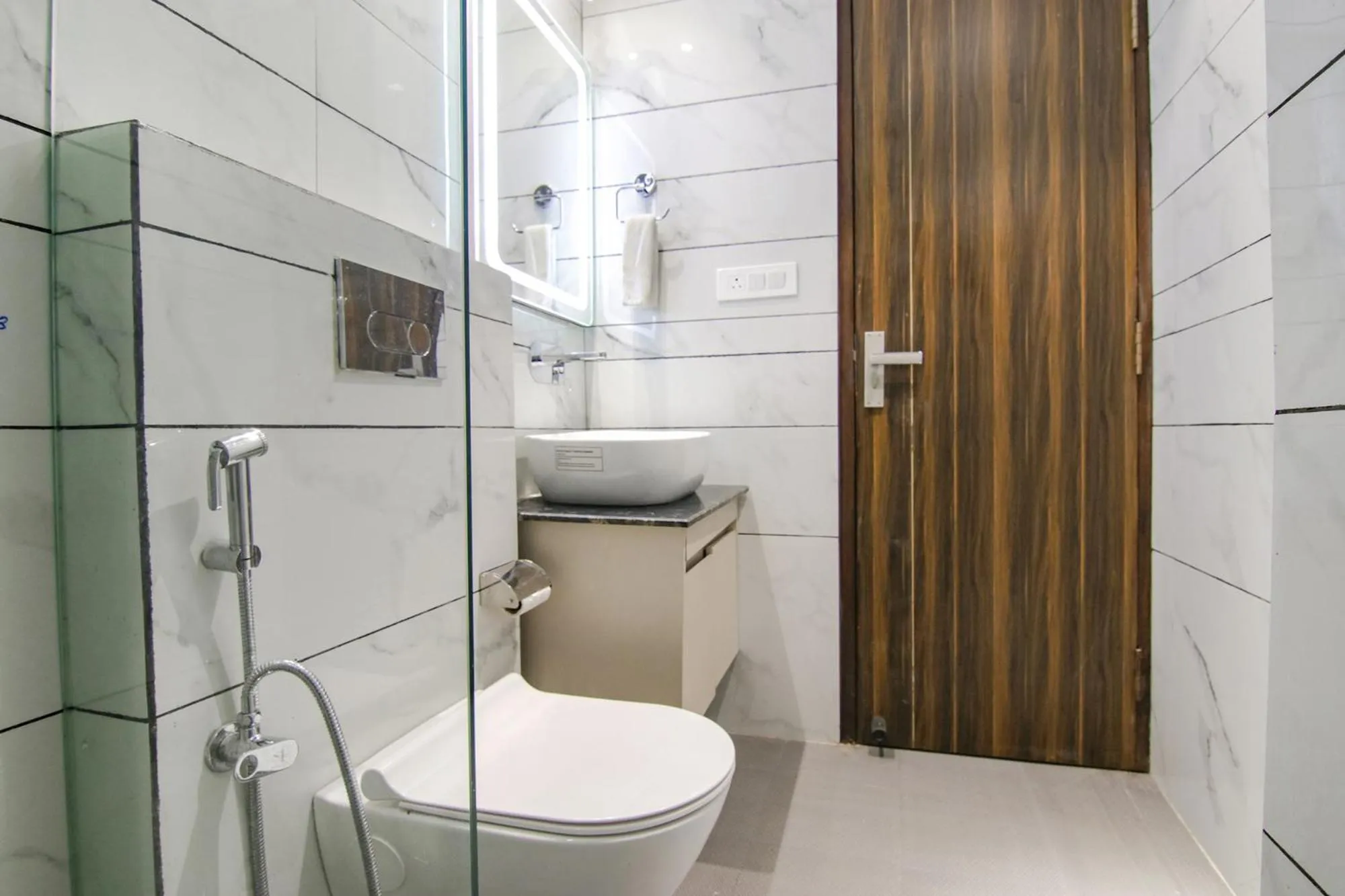 Bathroom in FabHotel Prism Grand - Nr Zirakpur Bus Stand'