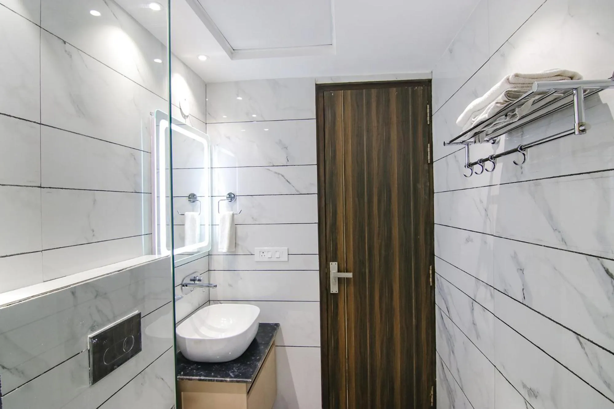 Bathroom in FabHotel Prism Grand - Nr Zirakpur Bus Stand'