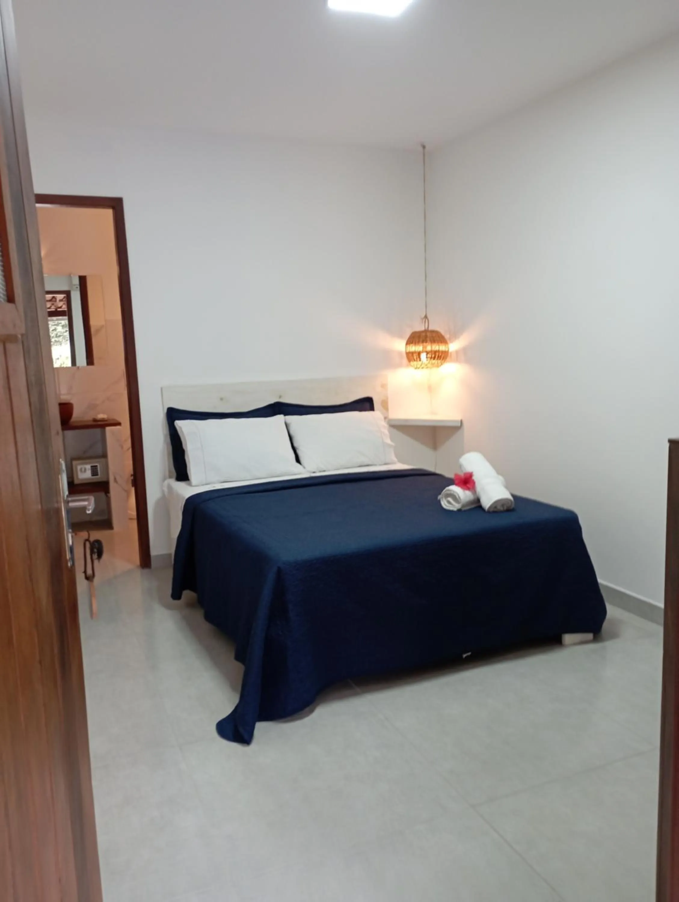 Bed in Pousada Casa Do Cocotier