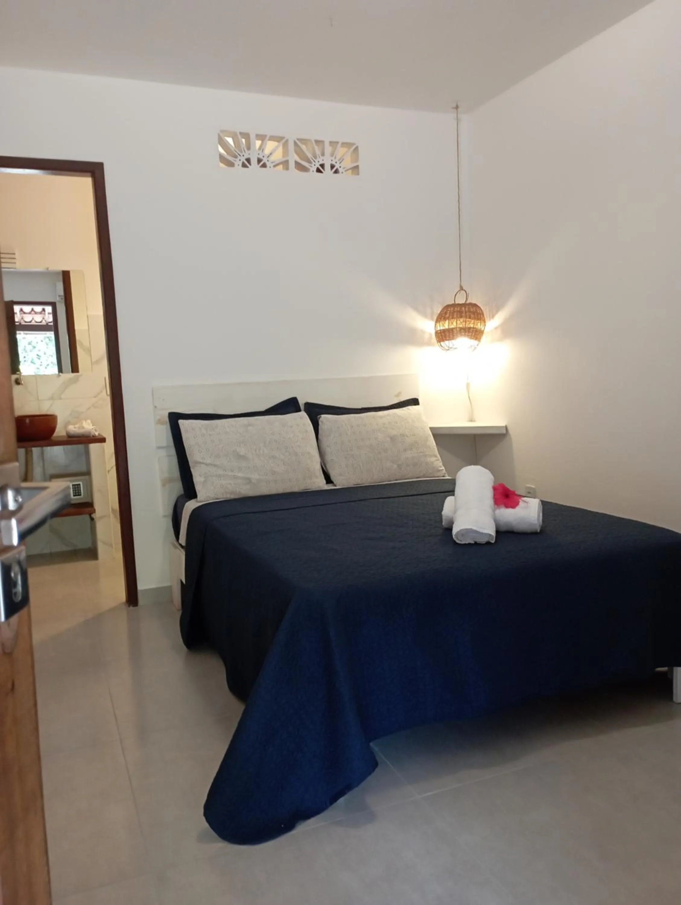 Bed in Pousada Casa Do Cocotier