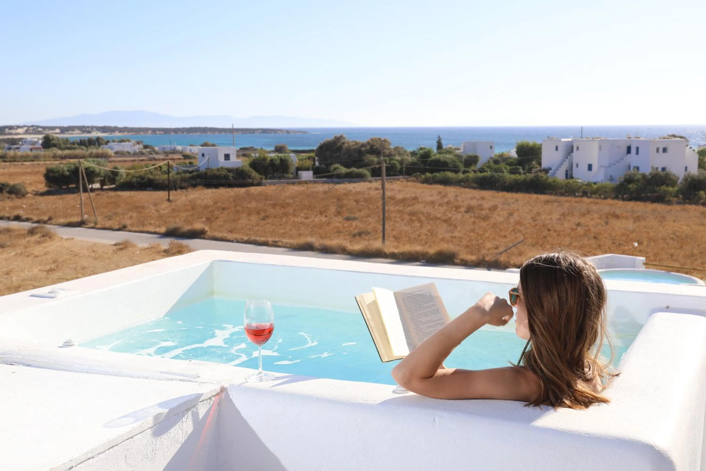 Honeymoon Suite with Outdoor Hot Tub and Sea View in Irida Vacation Suites