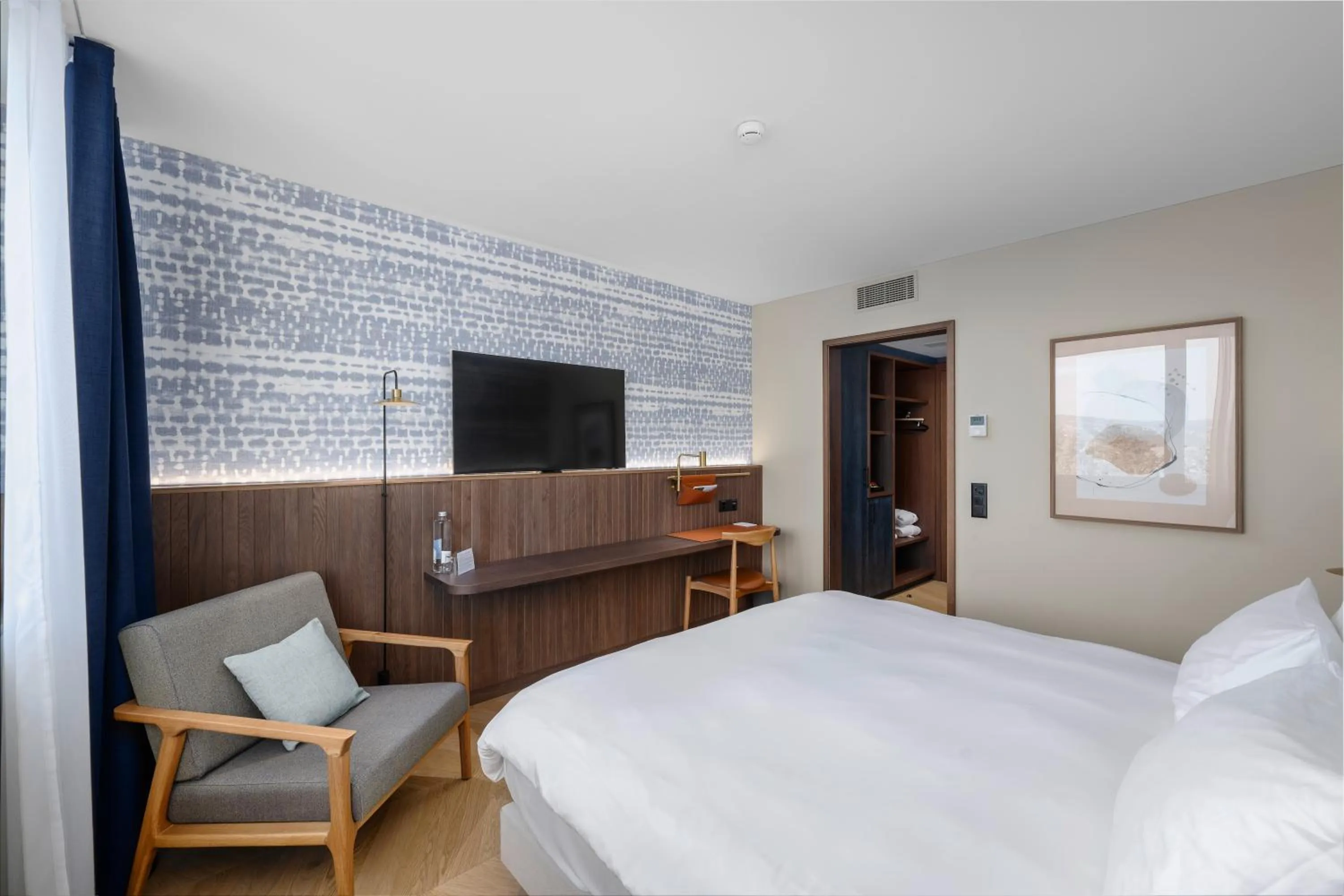 Bed in The Yarn Design & Business Hotel