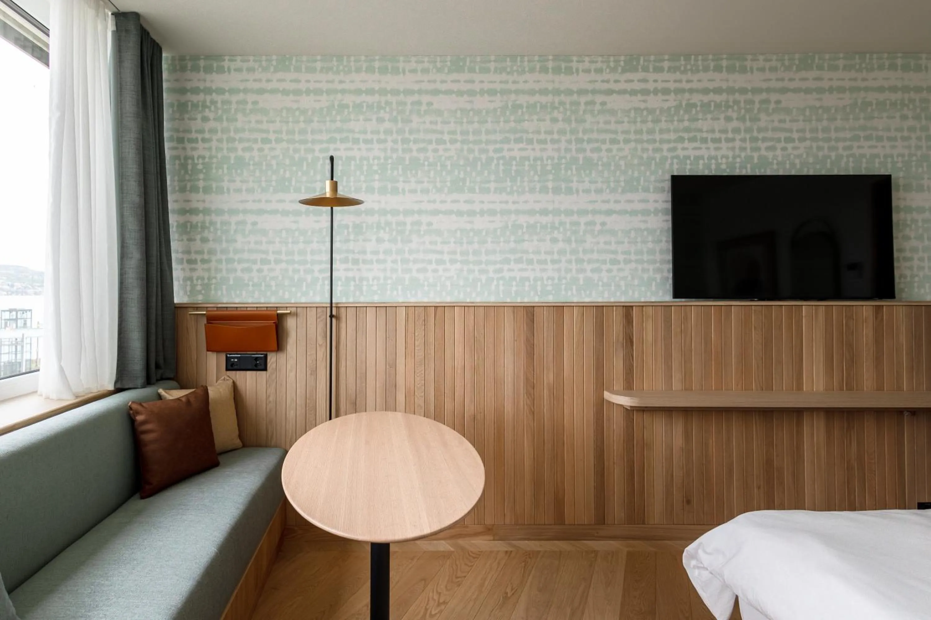 Seating area, Bed in The Yarn Design & Business Hotel