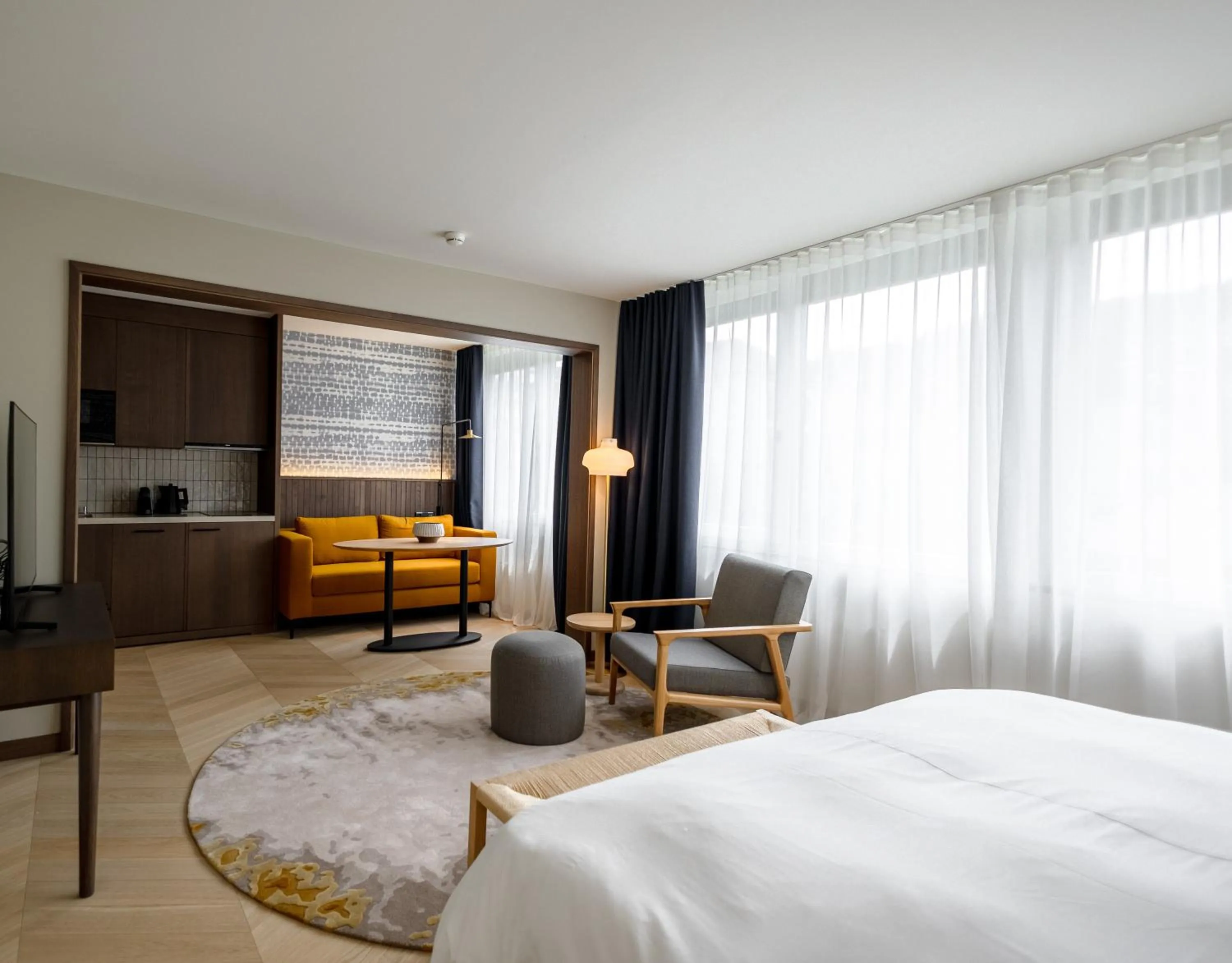 Kitchen or kitchenette, Bed in The Yarn Design & Business Hotel