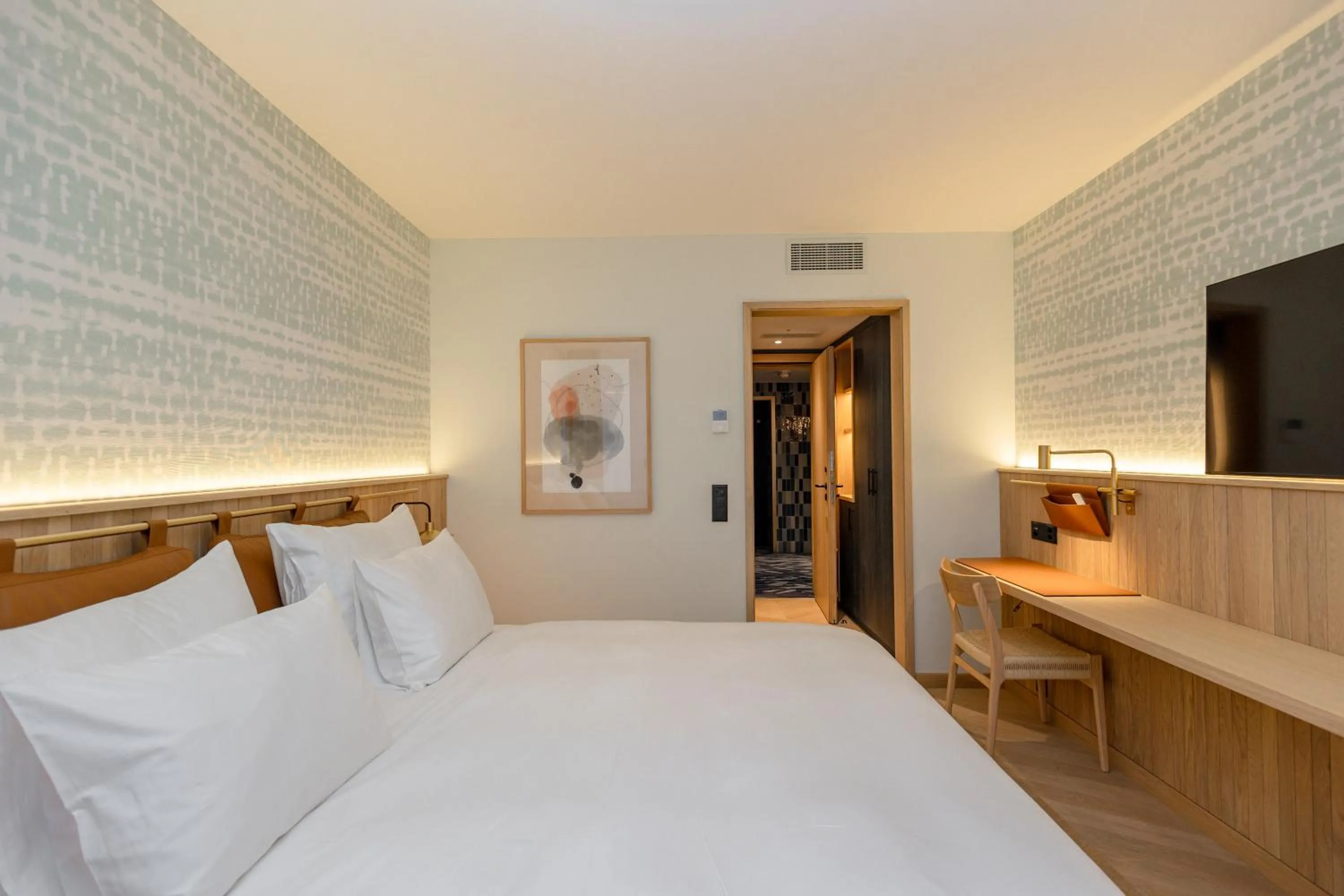 Bed in The Yarn Design & Business Hotel