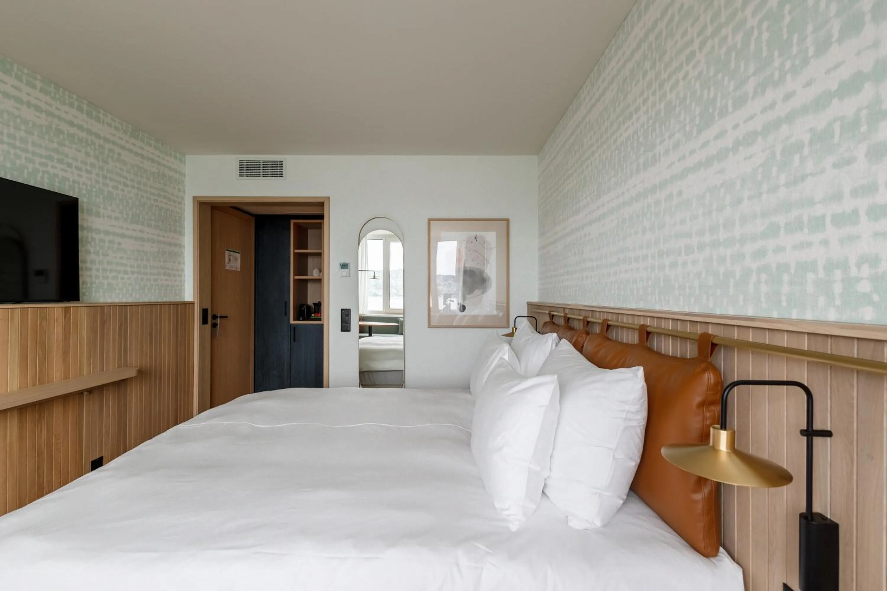 Bed in The Yarn Design & Business Hotel