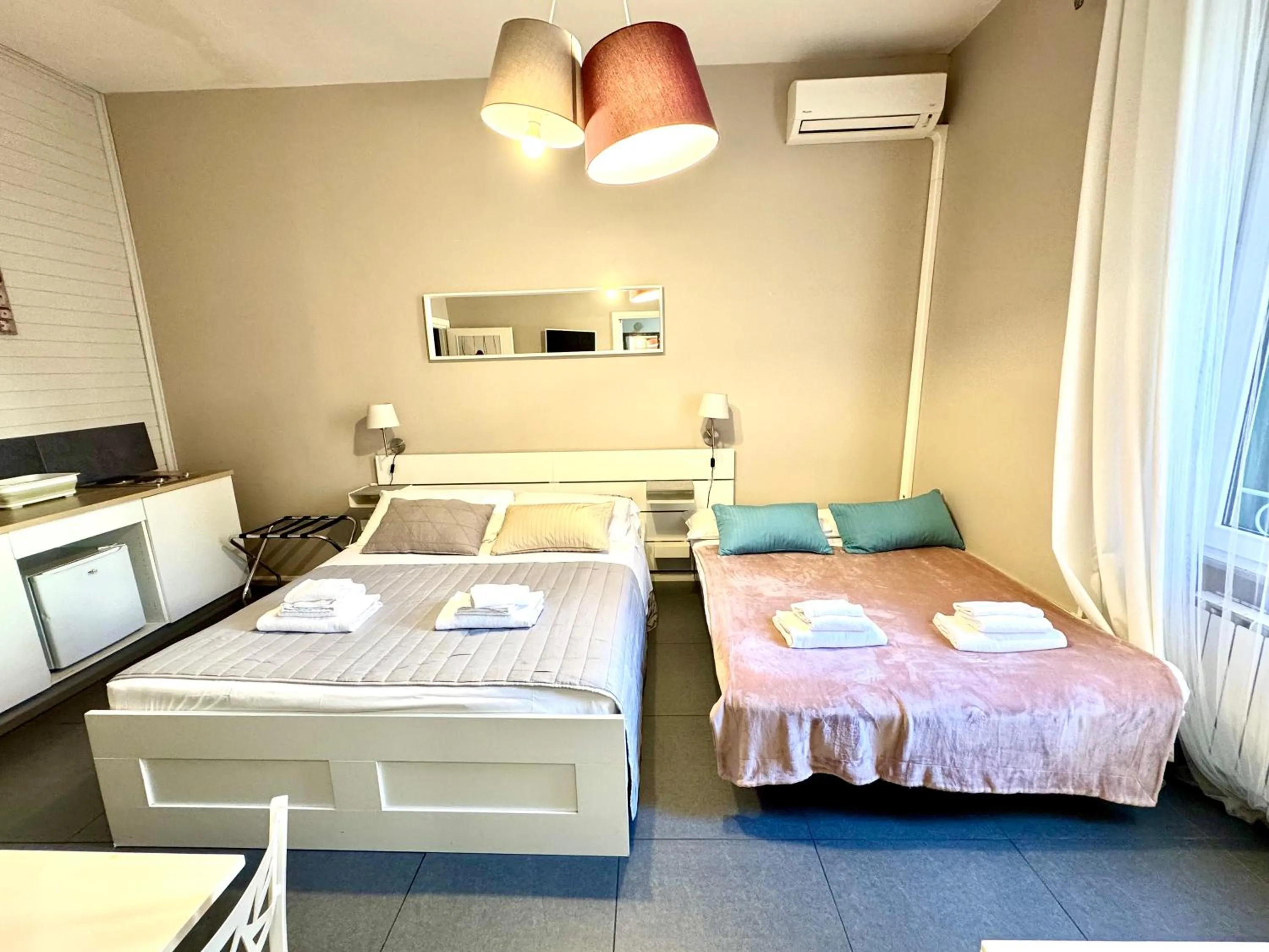 Photo of the whole room, Bed in Le Due Civette Roma