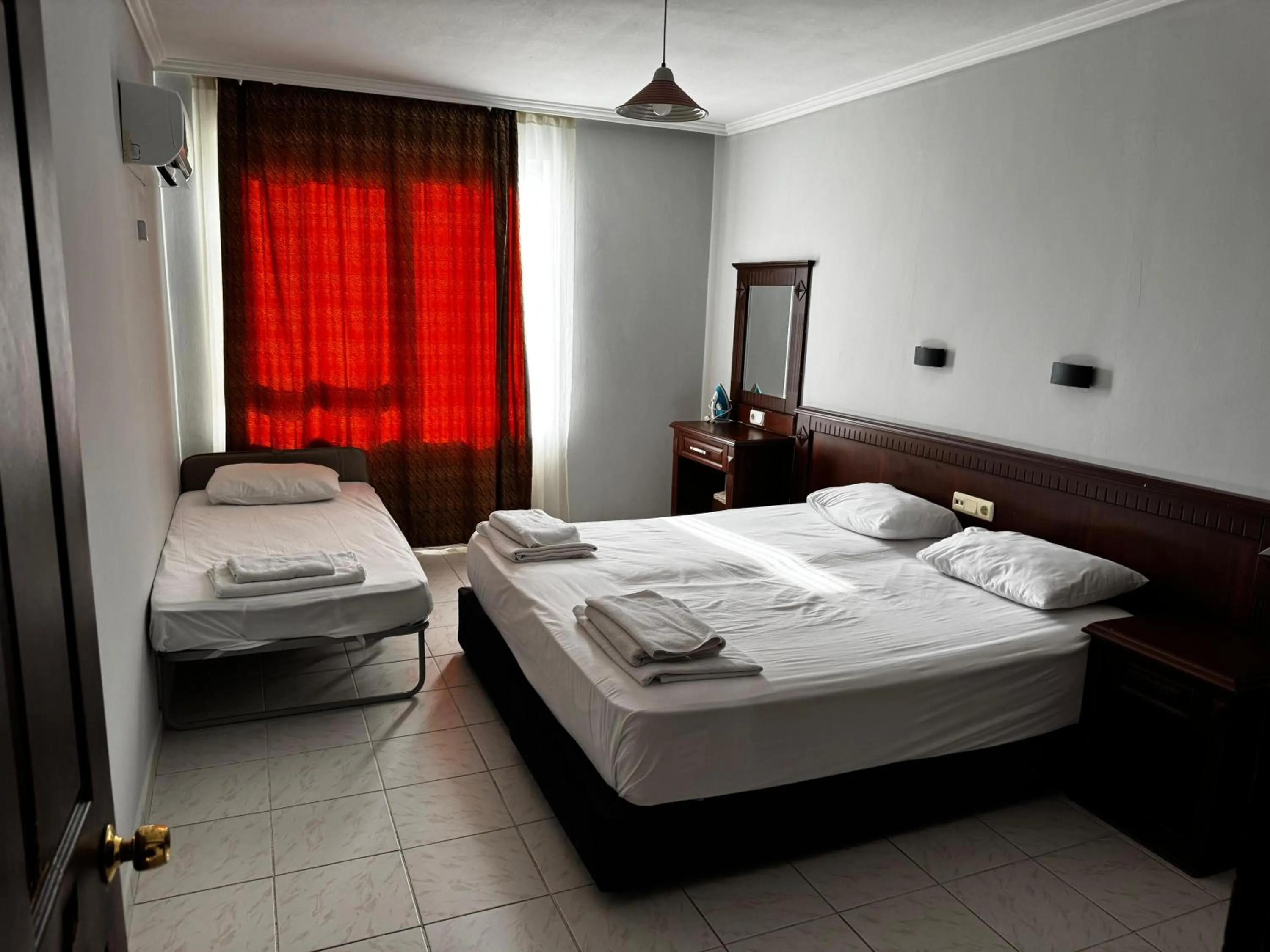 Bed in Rose Garden Apart Hotel