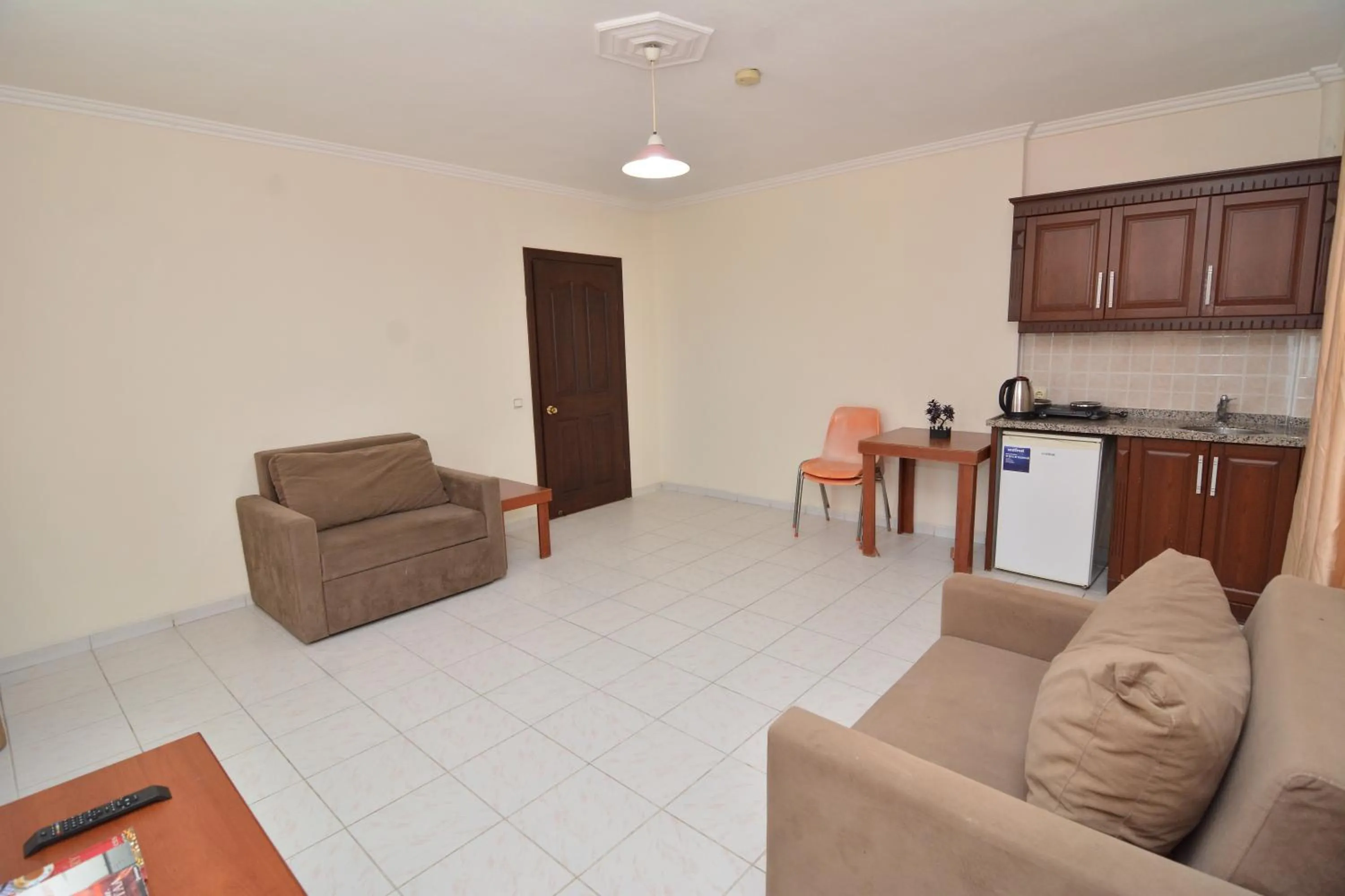 Kitchen or kitchenette in Rose Garden Apart Hotel