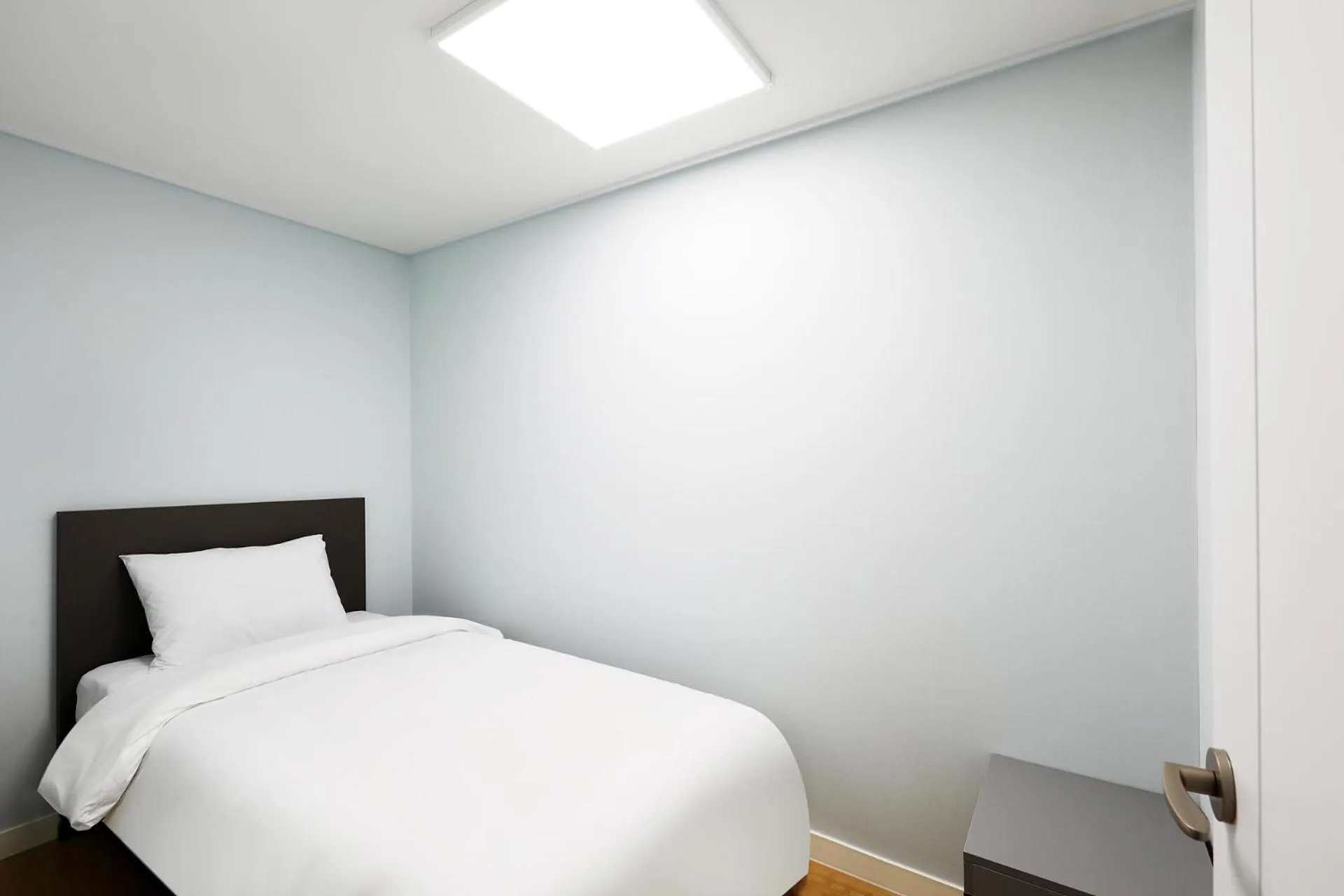 Bed in Mokpo Ocean Hotel