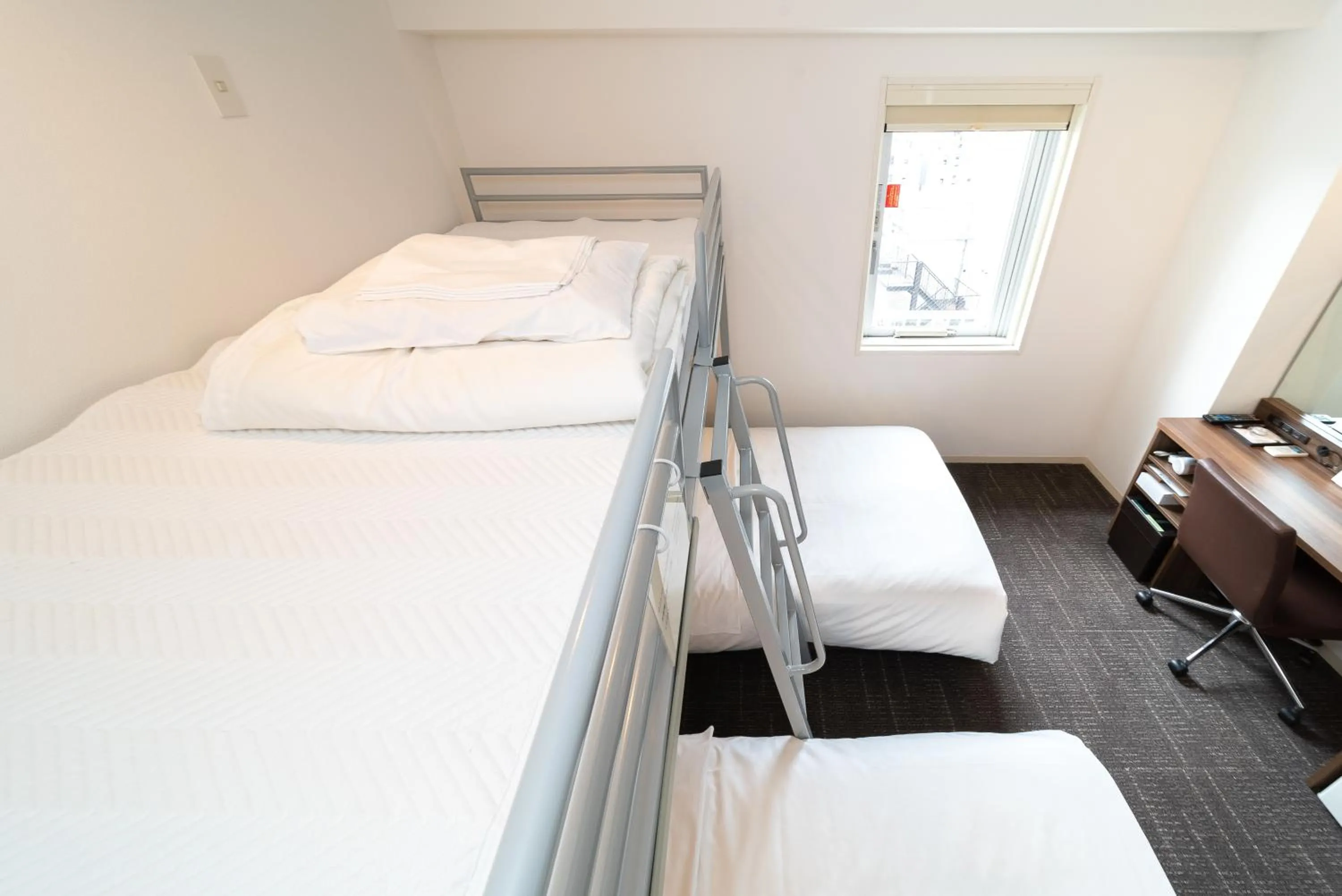 Bed in Super Hotel Tokyo JR Tachikawa Kitaguchi