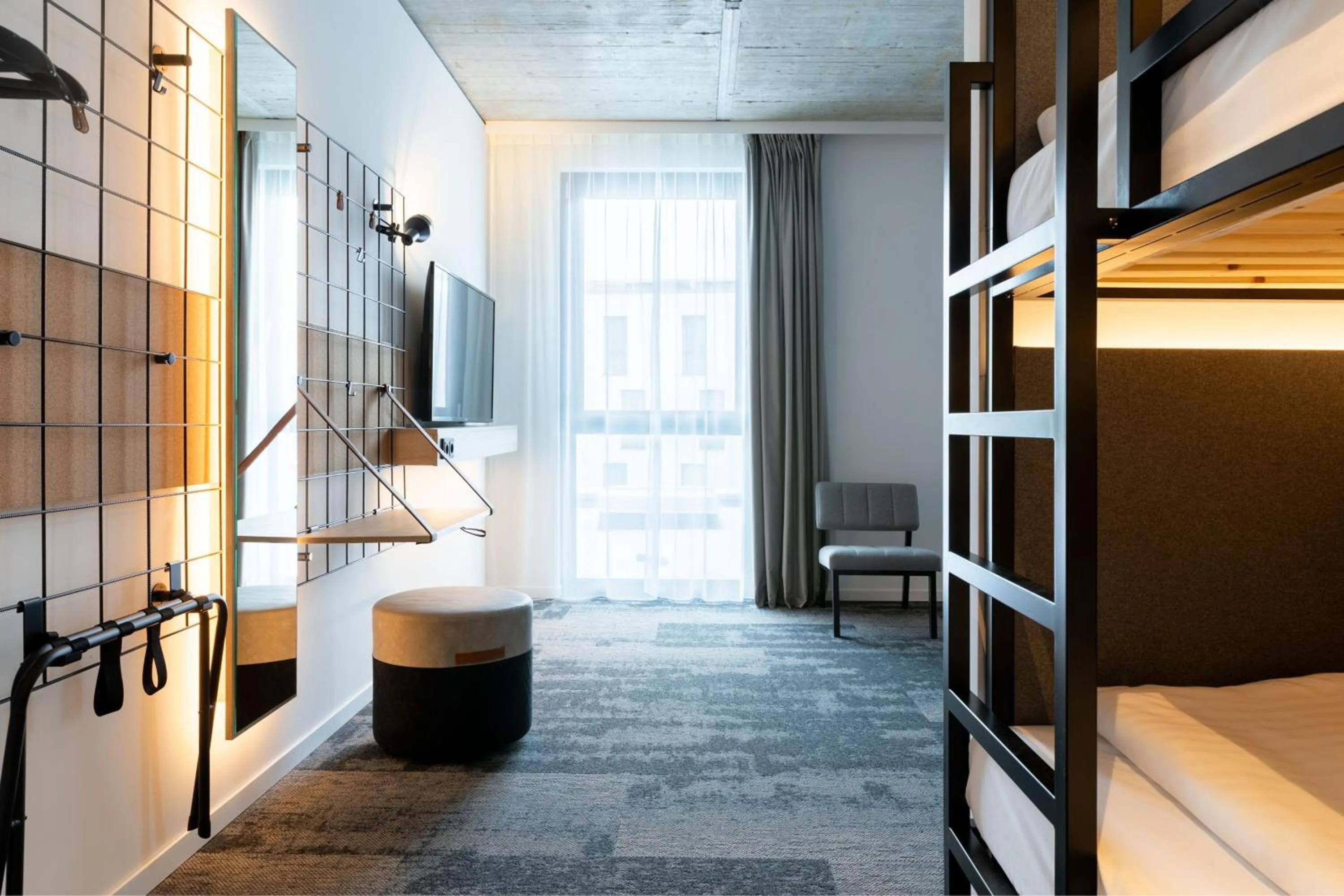 Photo of the whole room, Bed in Moxy Outletcity Metzingen