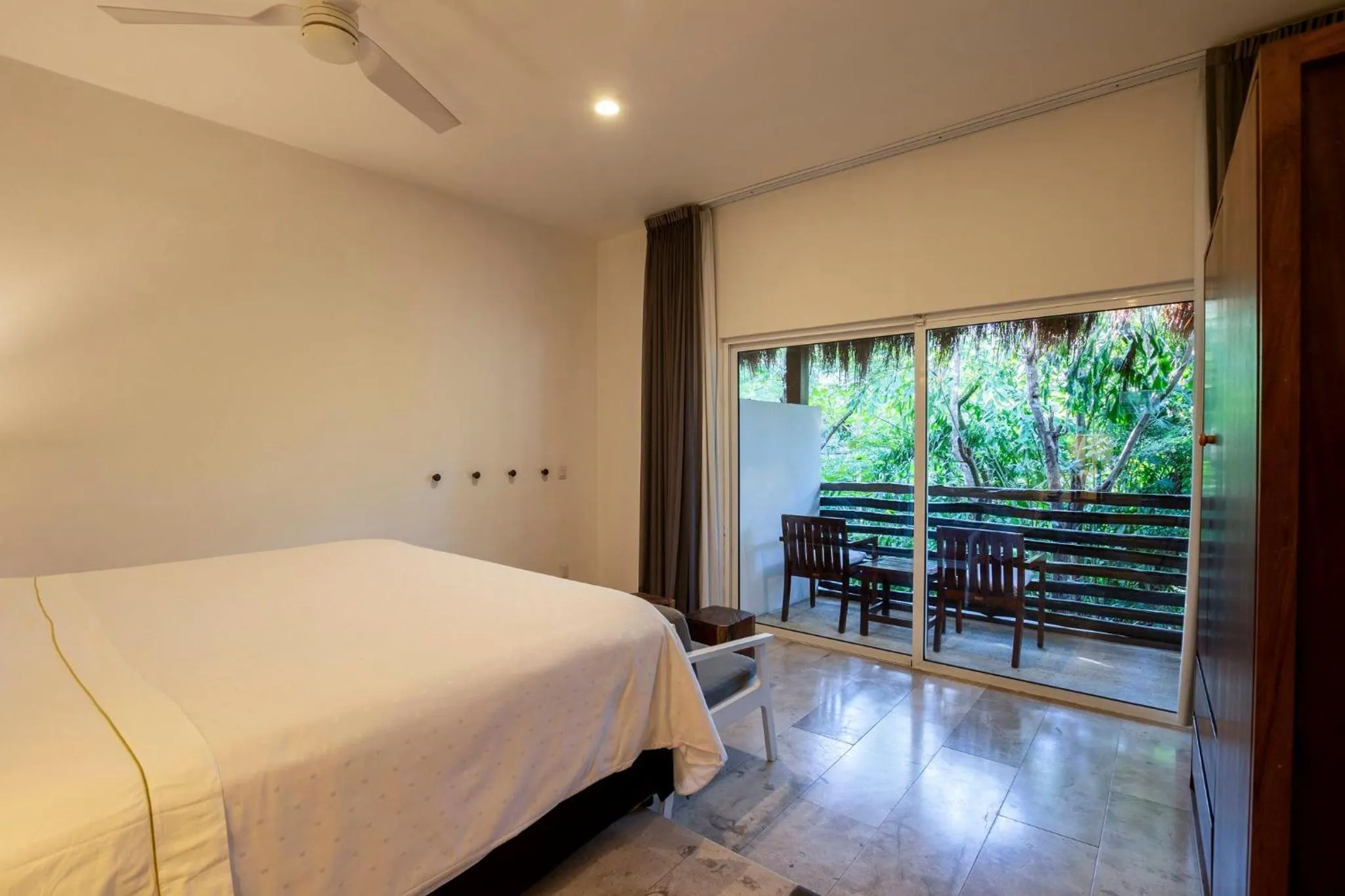 Photo of the whole room, Bed in The Explorean Cozumel All Inclusive