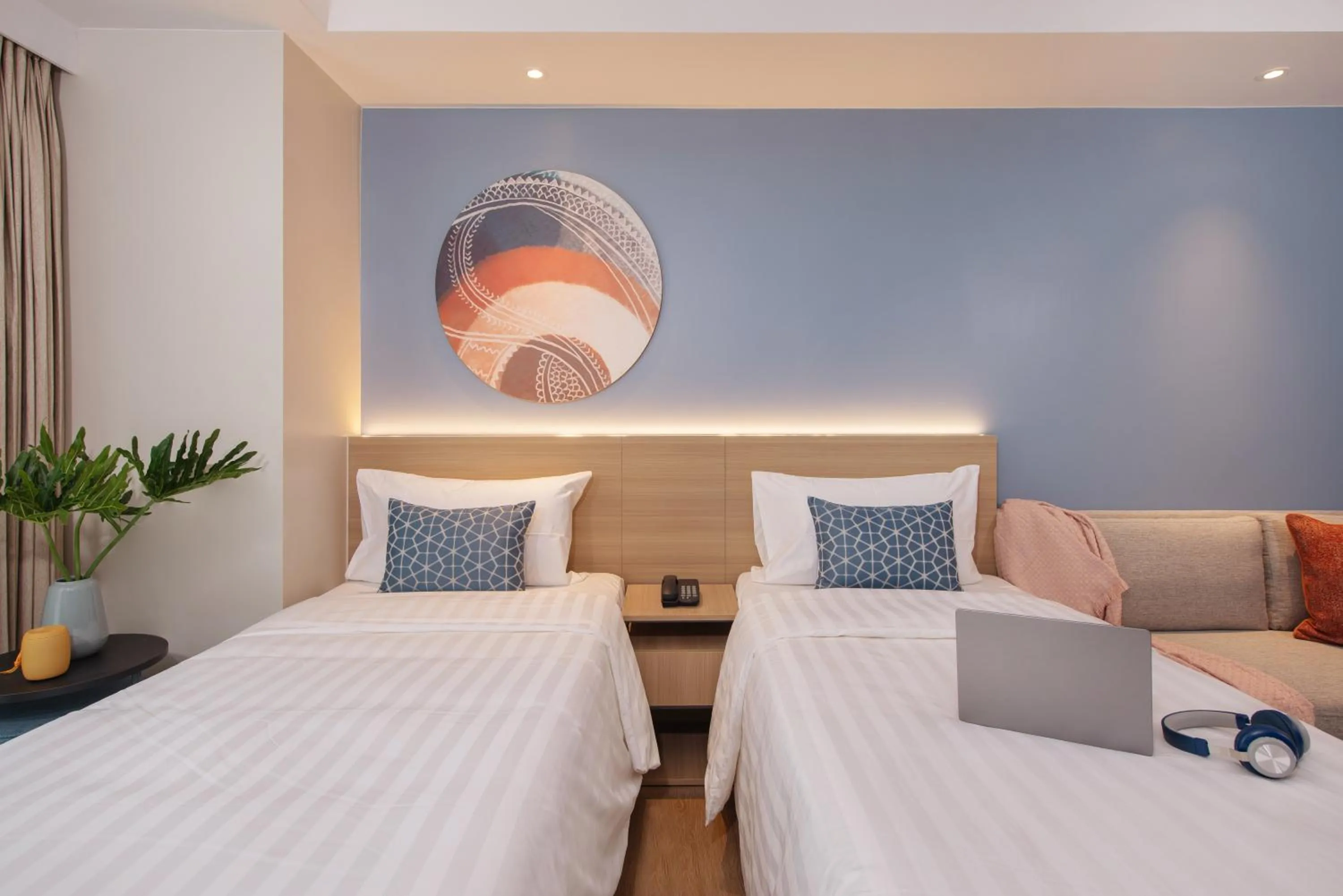 Bed in Citadines Roces Quezon City