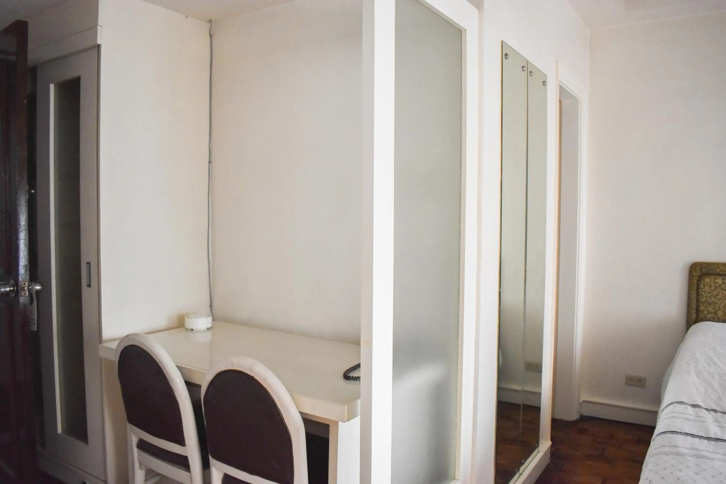 Living room, Bed in Sunette Tower Suites Makati