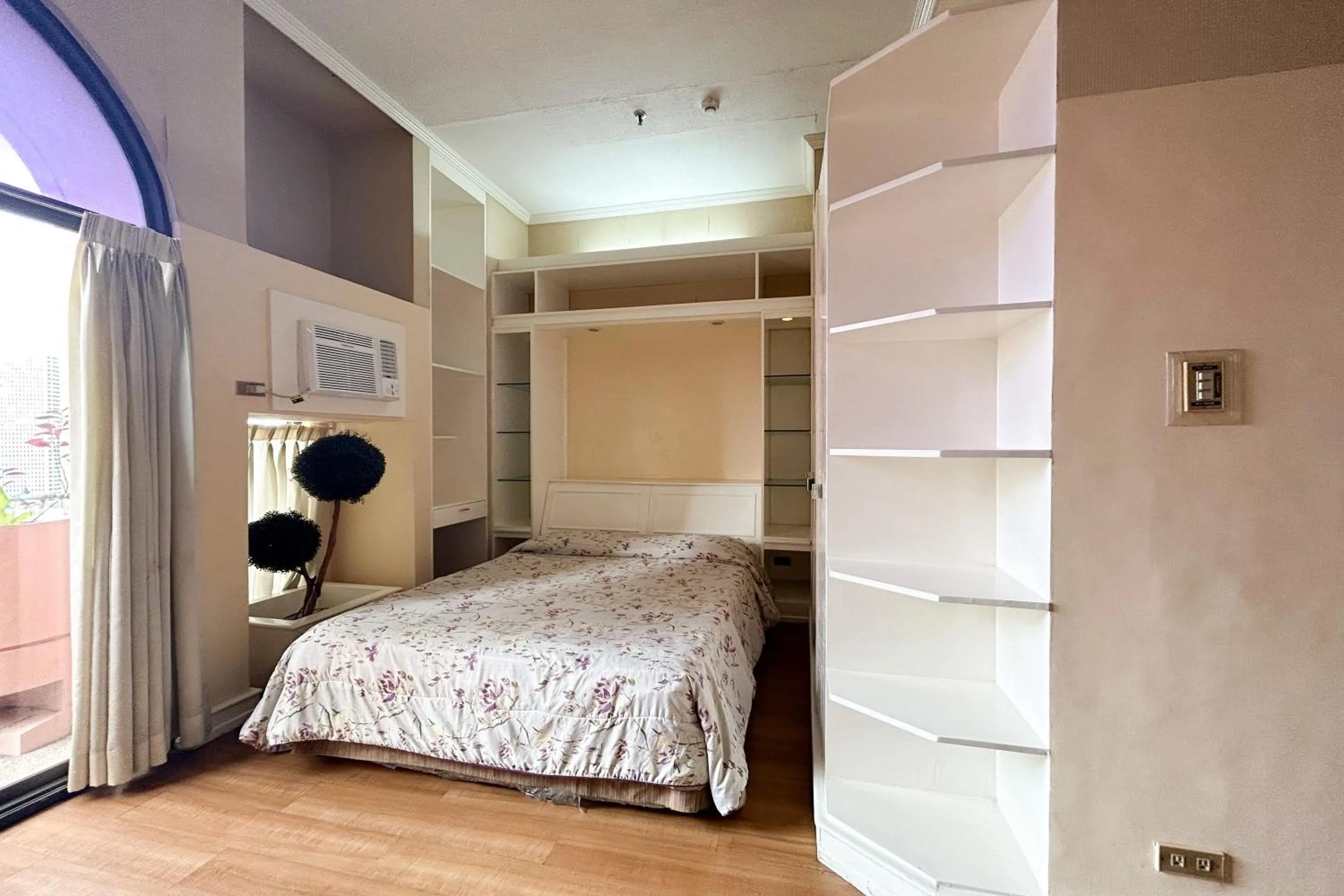 Bed in Sunette Tower Suites Makati