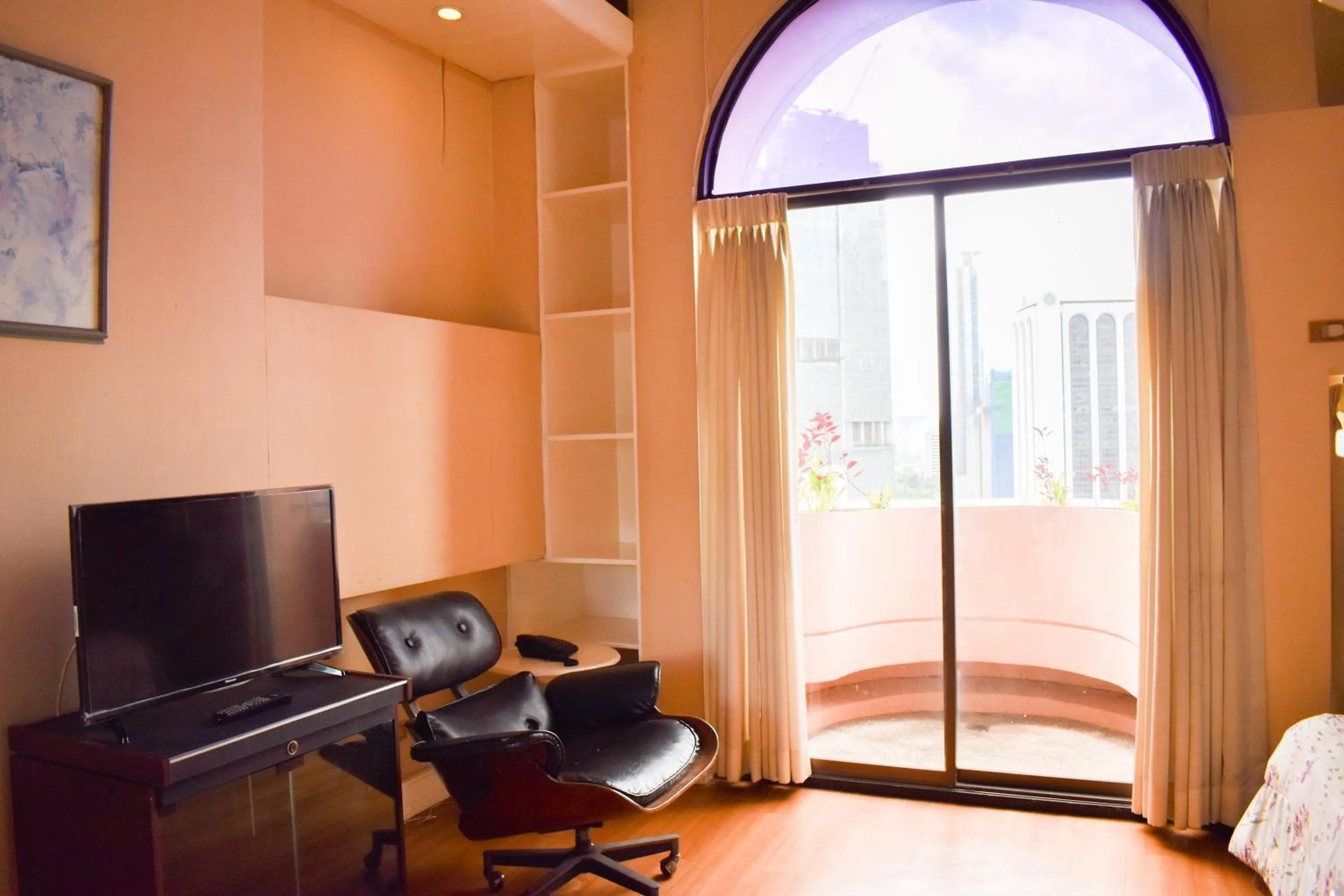 Bed in Sunette Tower Suites Makati