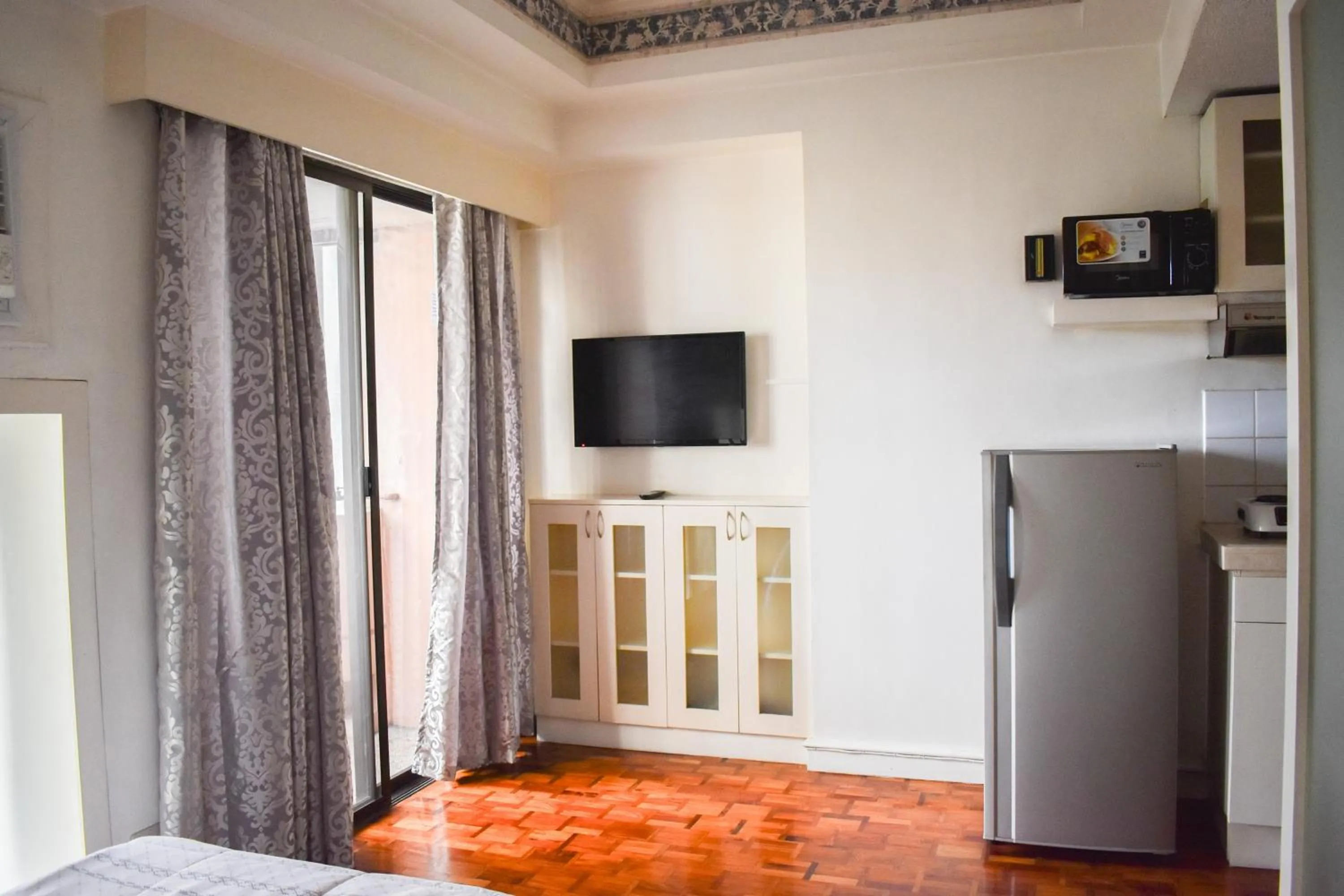 Bed in Sunette Tower Suites Makati