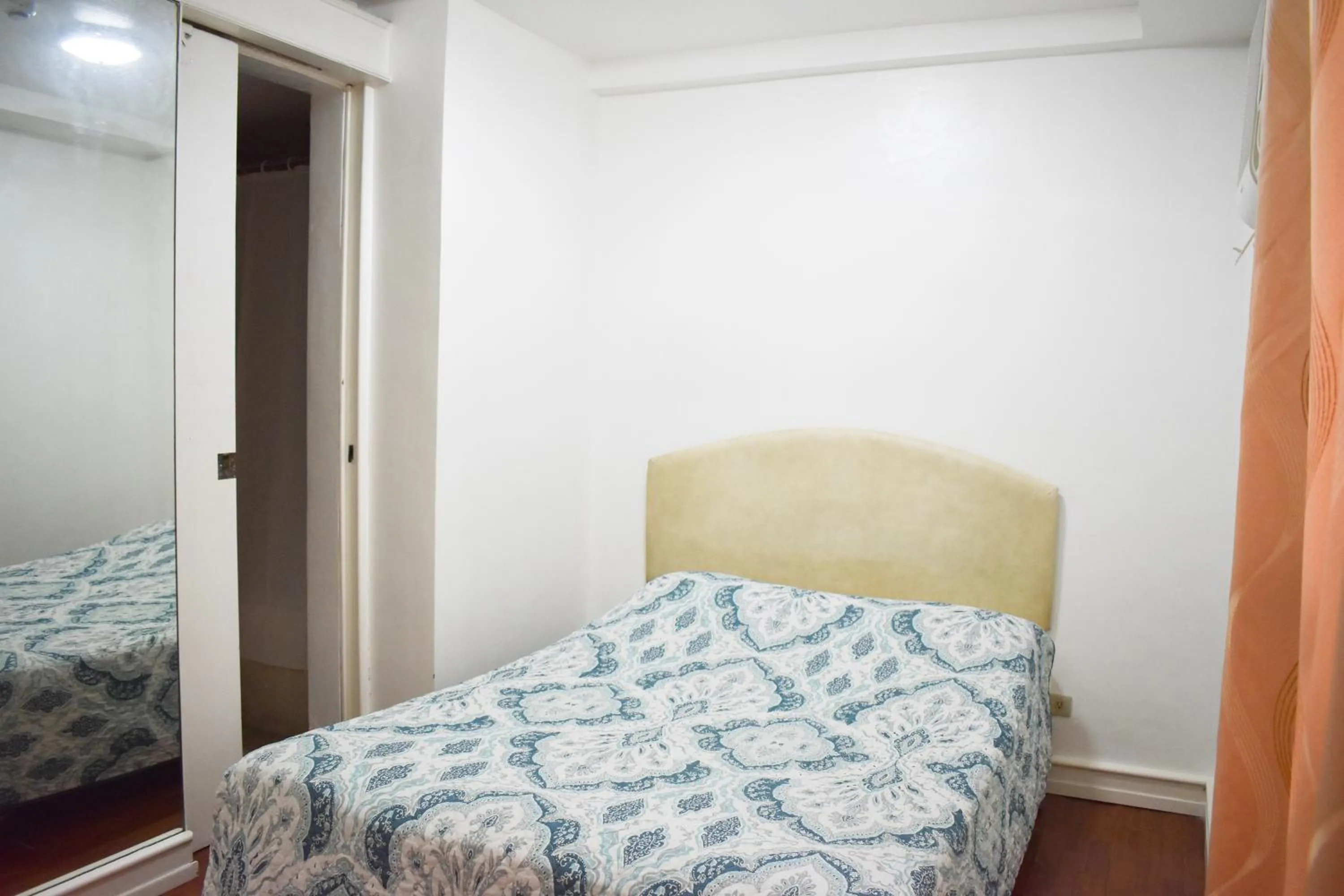 Bed in Sunette Tower Suites Makati