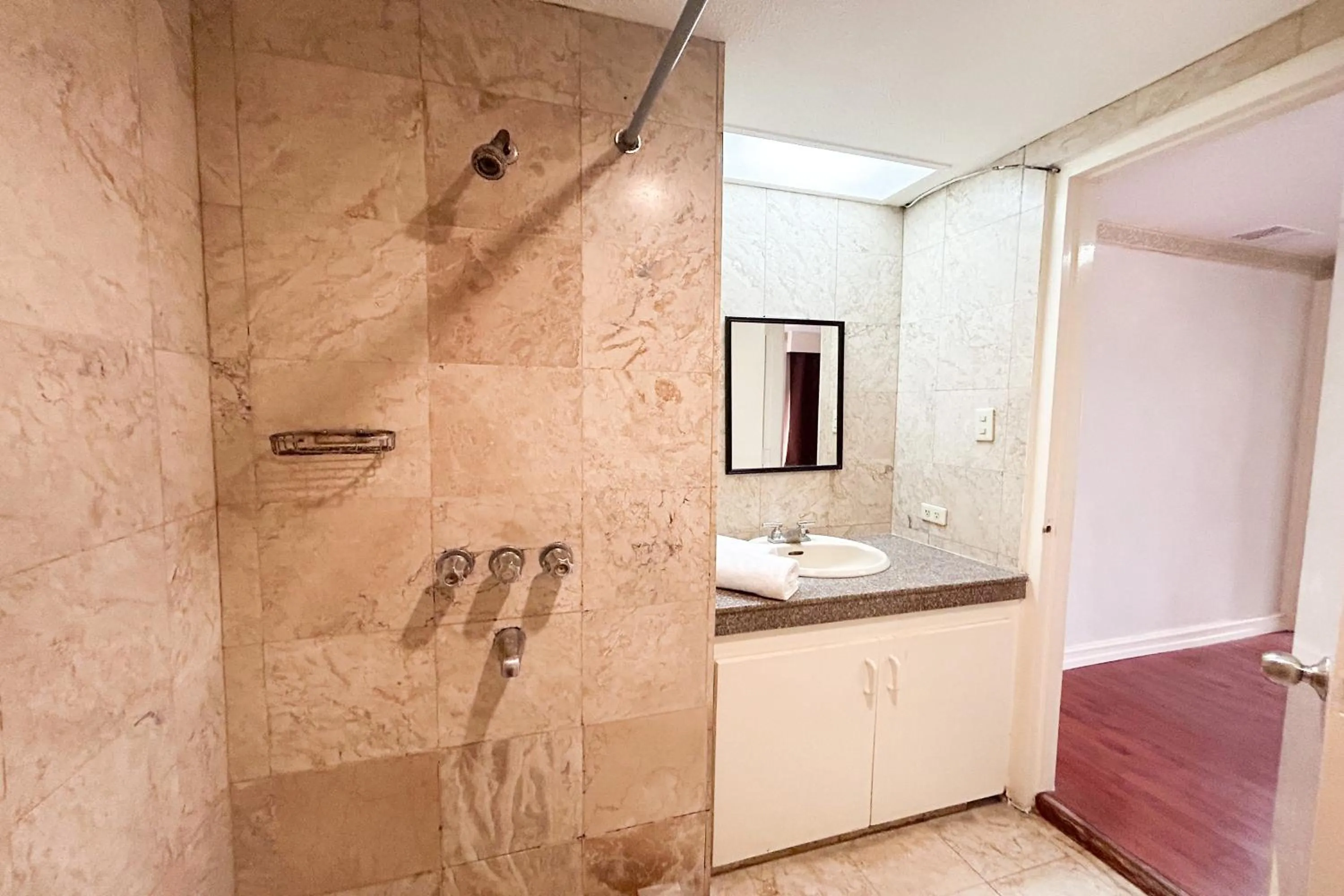 Shower in Sunette Tower Suites Makati