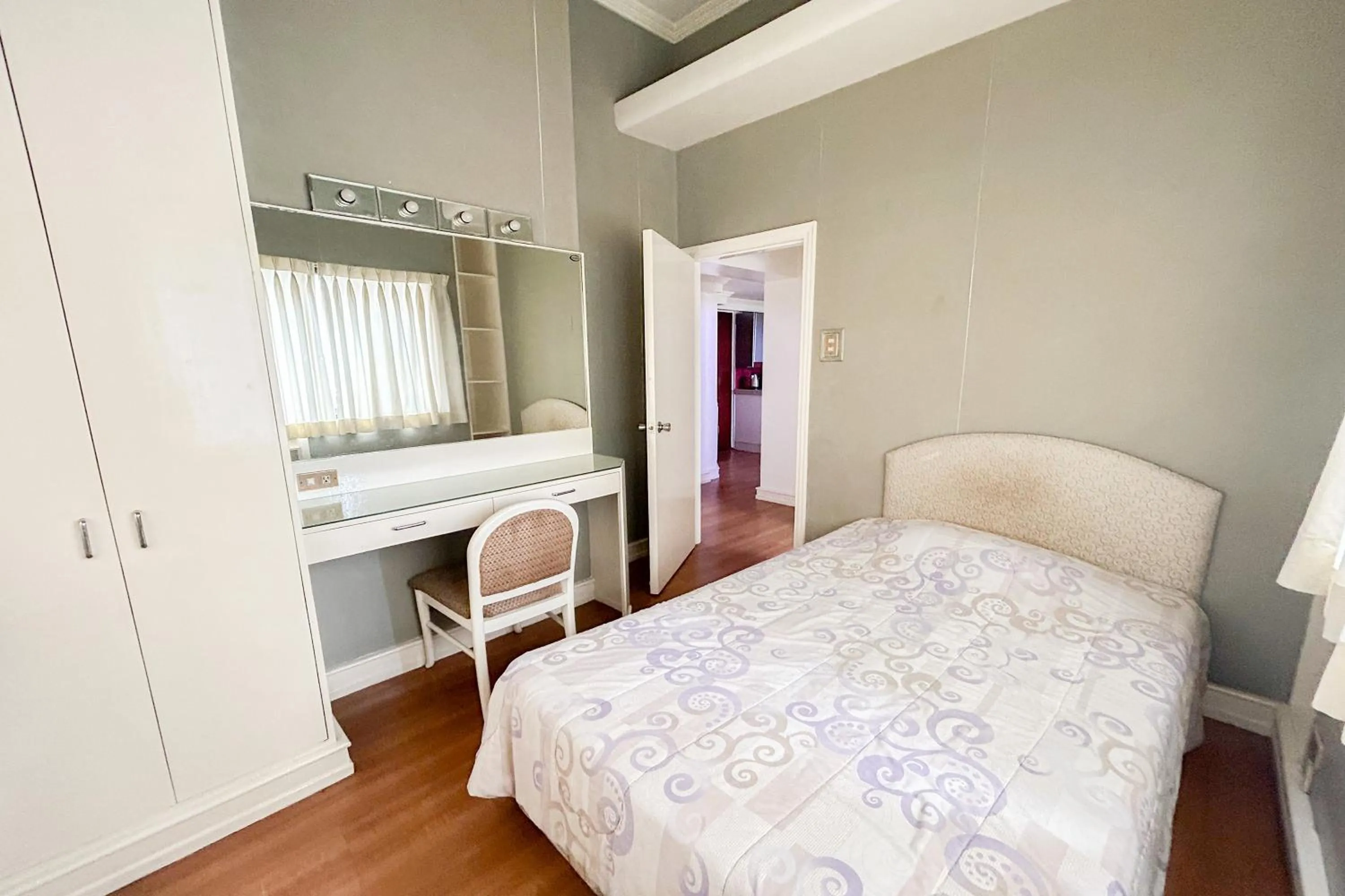 Bed in Sunette Tower Suites Makati