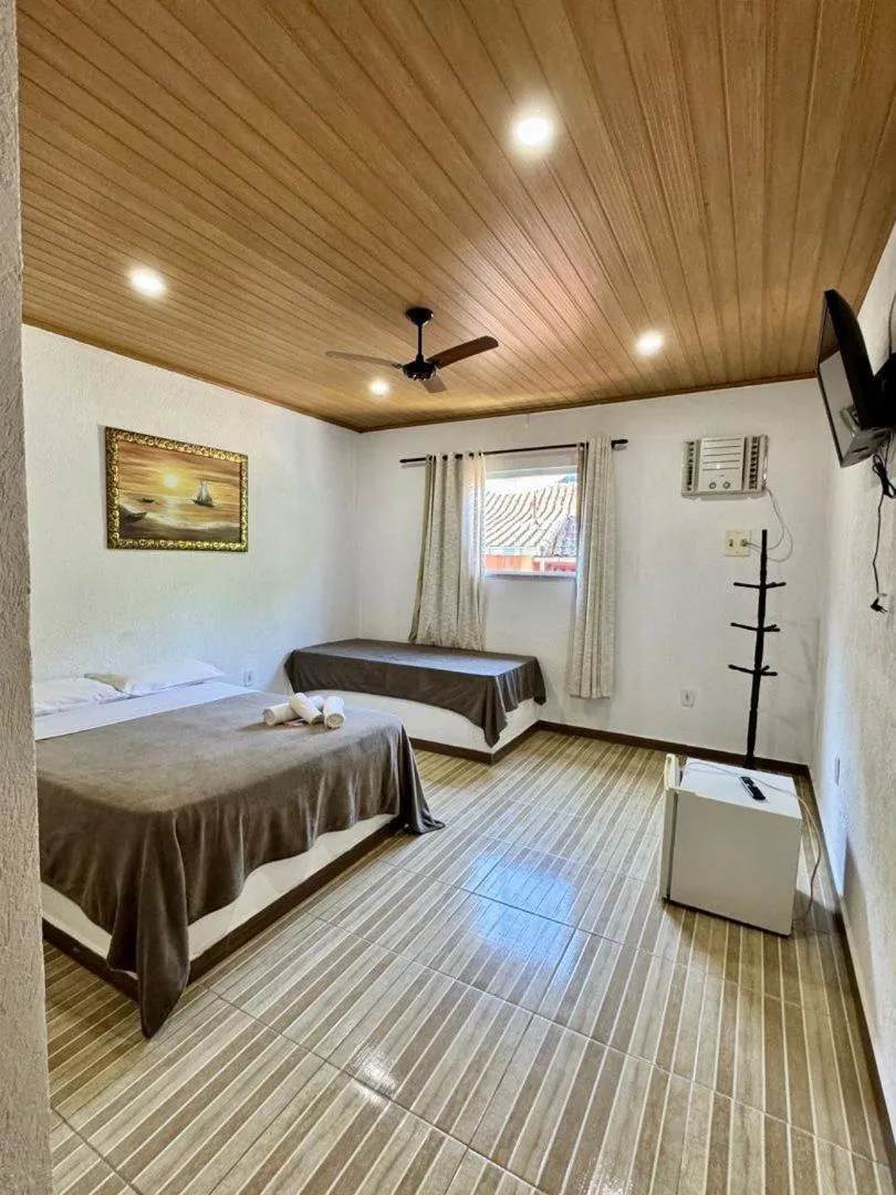 Bed in Pousada da Praia