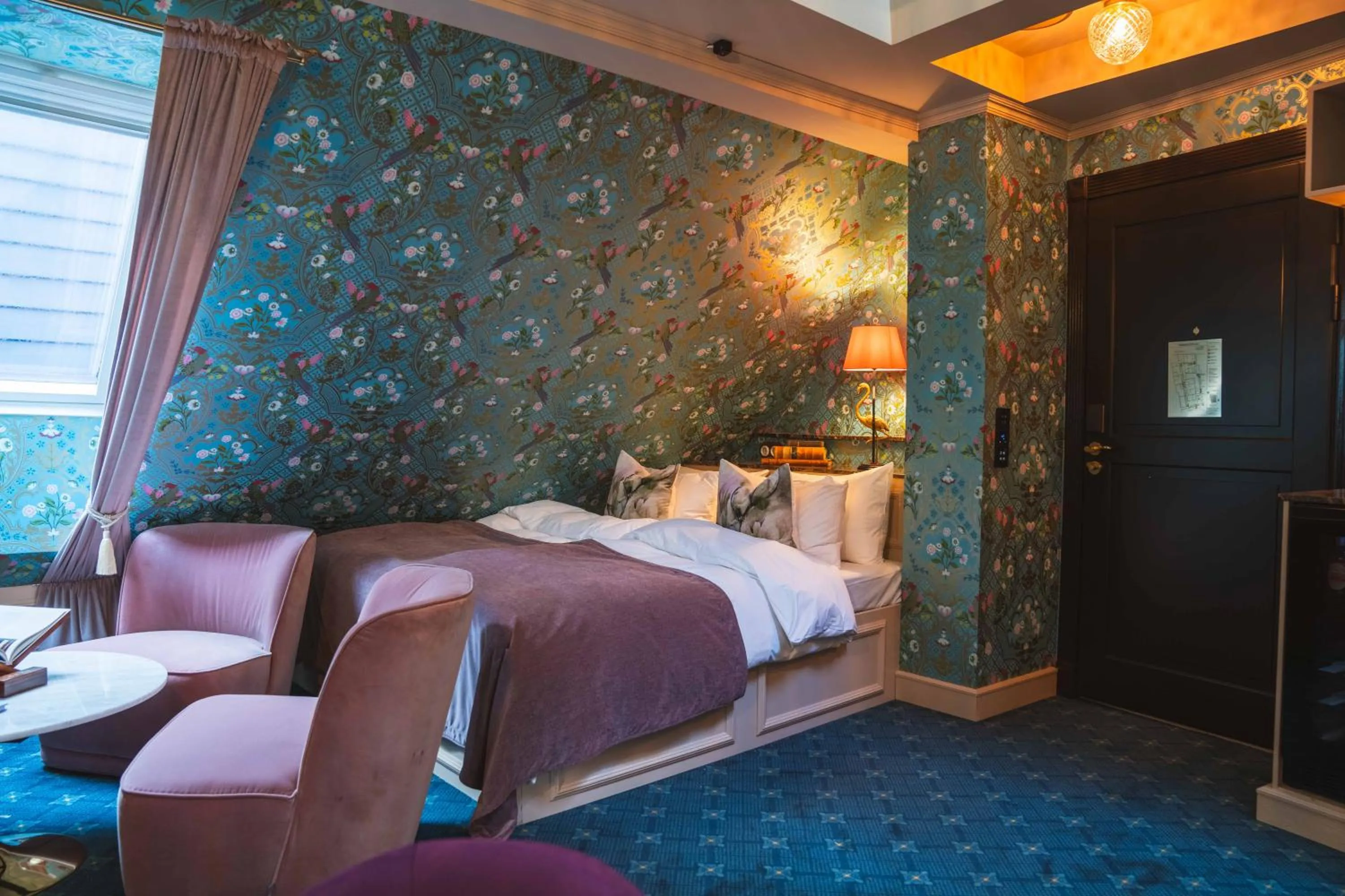 Bed in Charmante Skostredet Hôtel