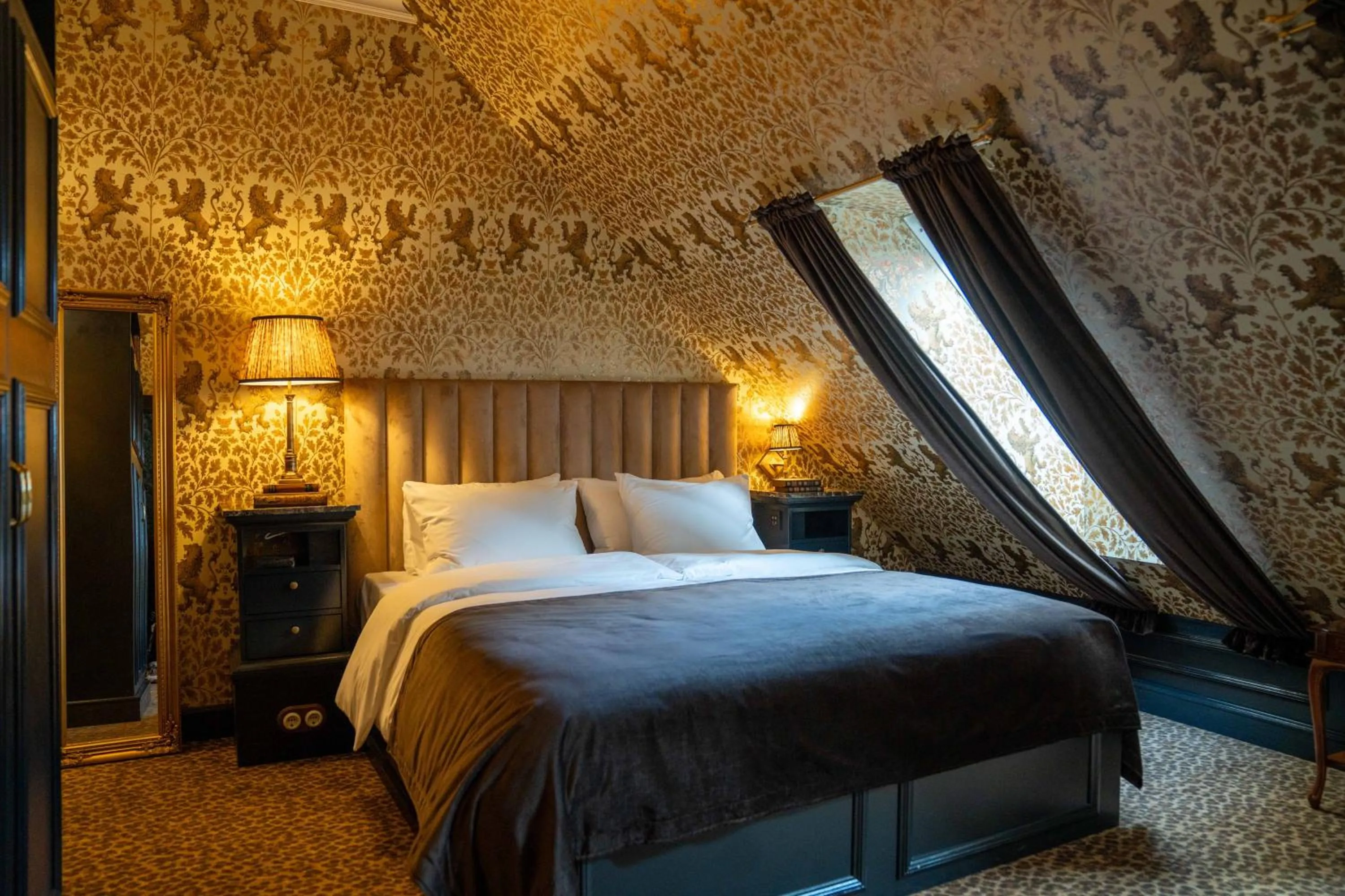 Bed in Charmante Skostredet Hôtel